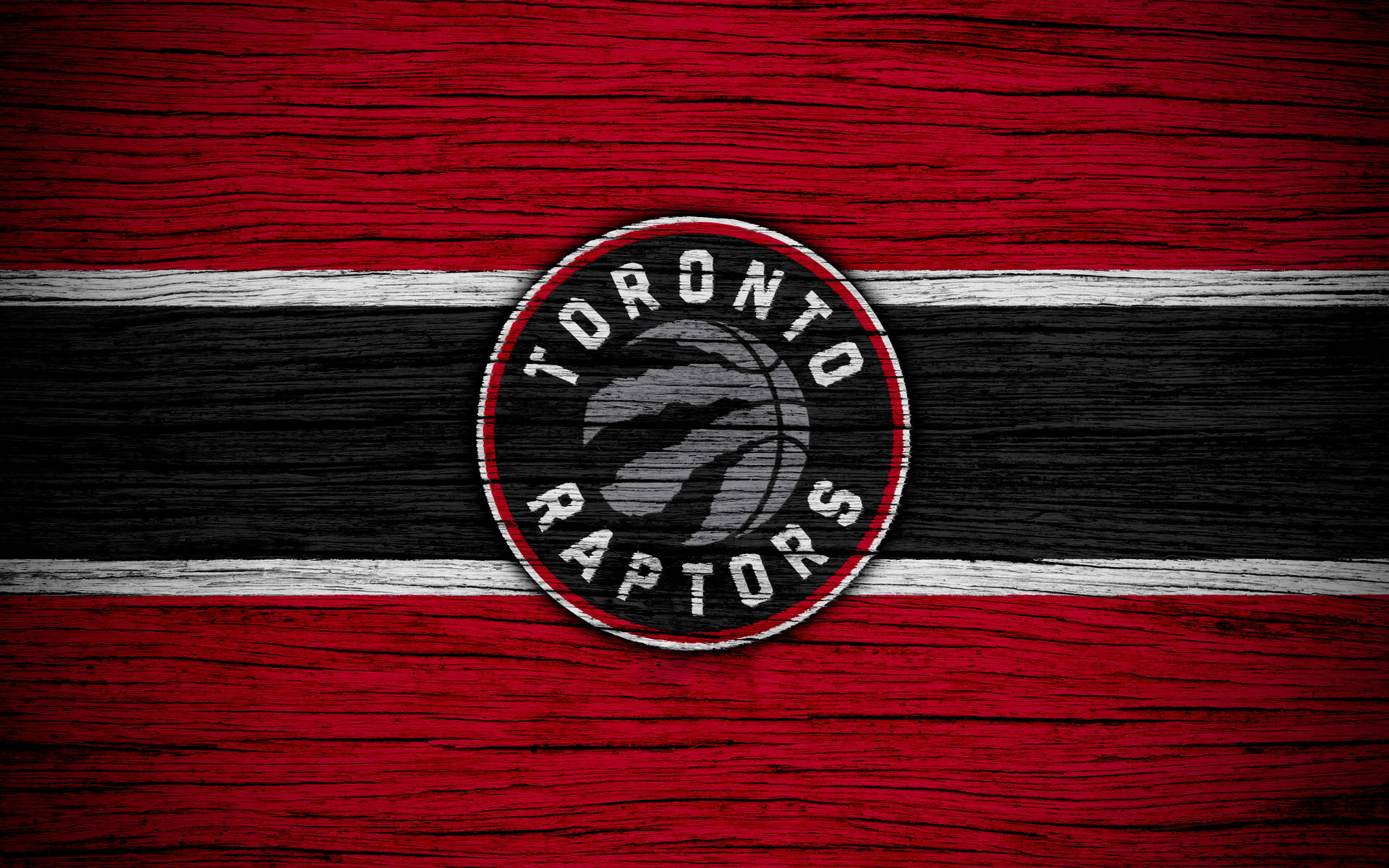 Logode Los Toronto Raptors En Madera Fondo de pantalla