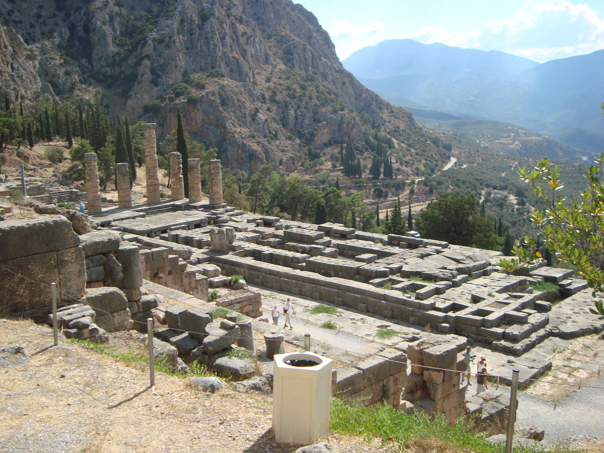 Tourists In Delphi Background