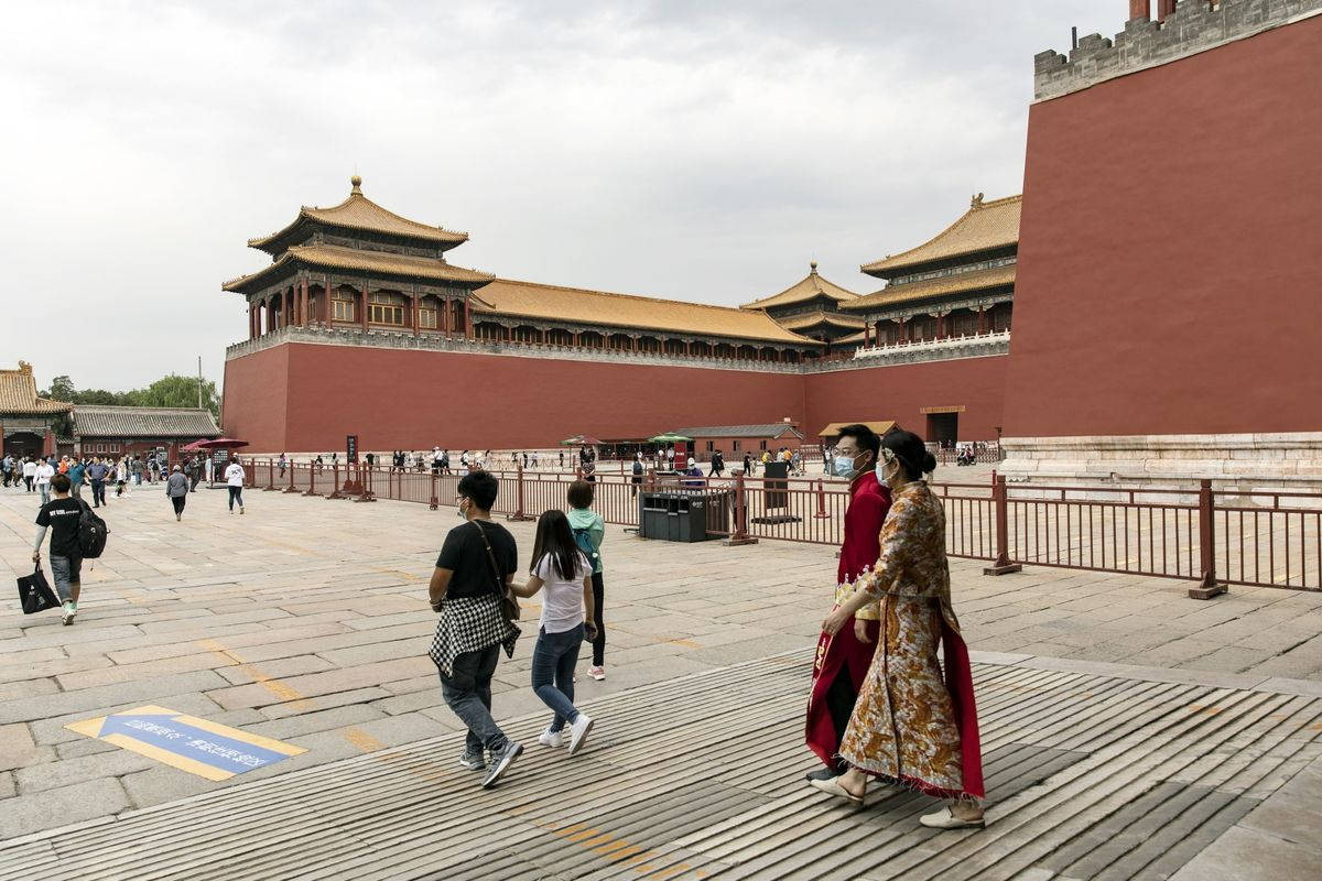 Tourists Walking Around Forbidden City Wallpaper