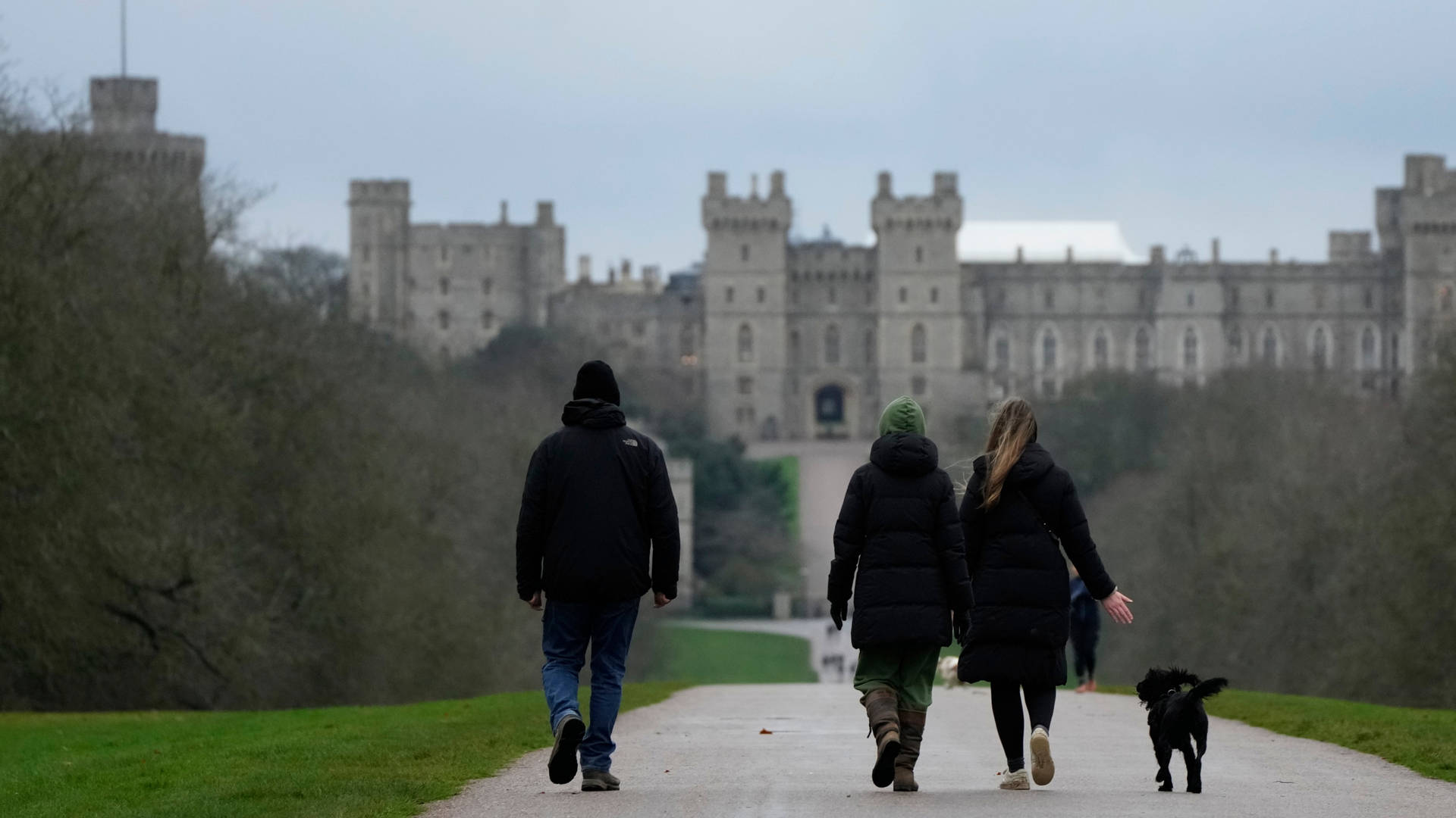Tourists Walking Windsor Castle With Dog Wallpaper