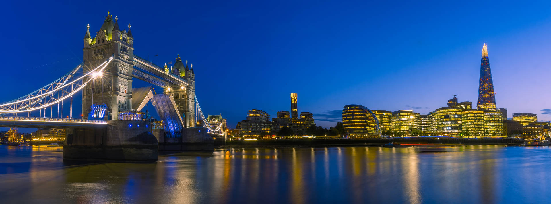 Tower Bridge And Buildings At Night
