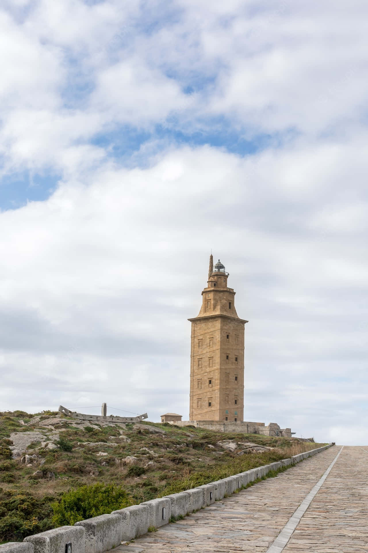 Tower Of Hercules In The Distance Phone Wallpaper