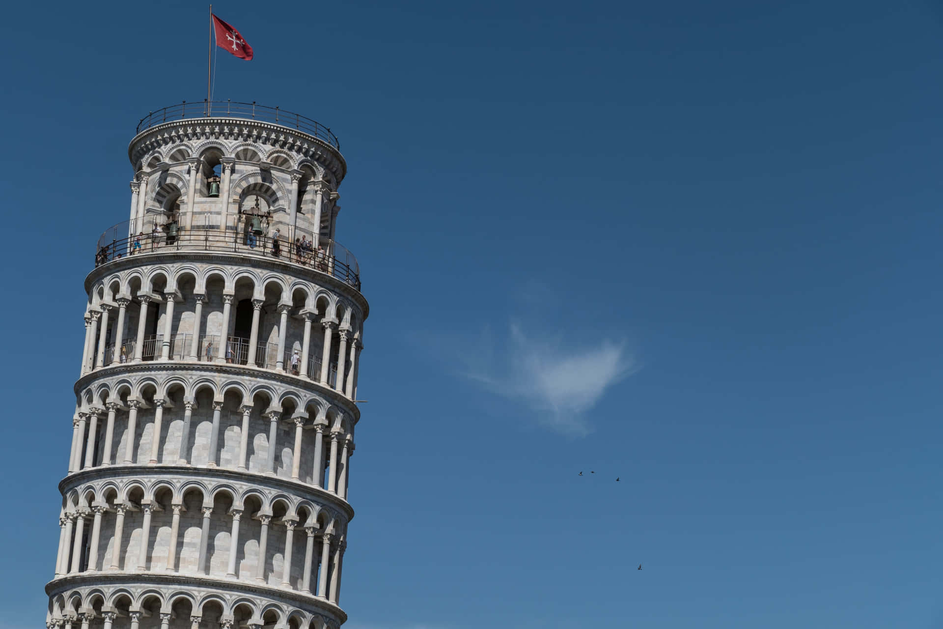 Tower Of Pisa With Pisan Cross Flag Wallpaper