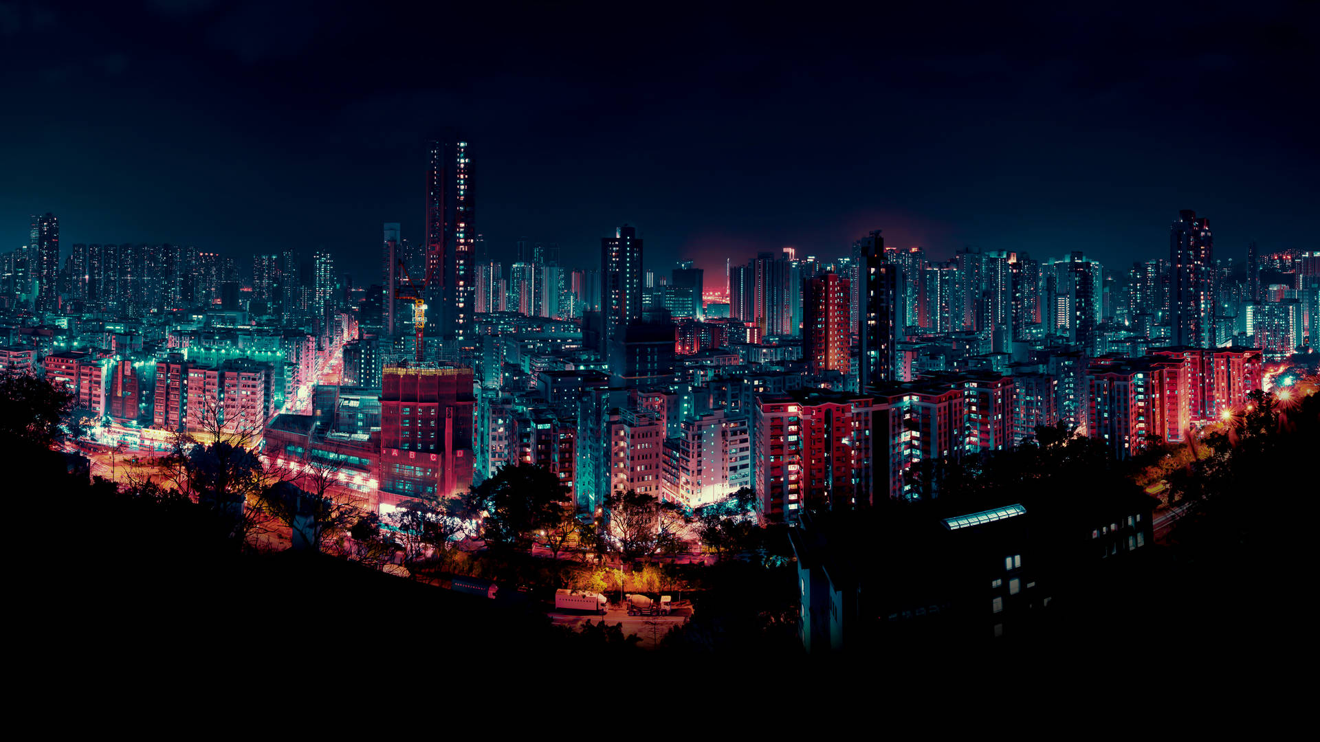 Towering Buildings Neon City At Night Wallpaper