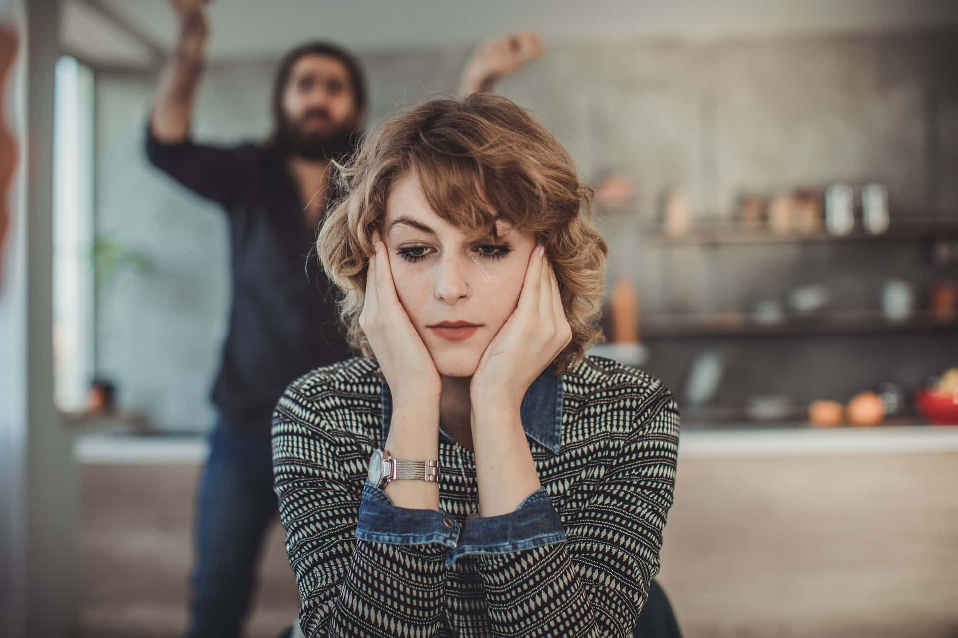 Woman In The Kitchen With Man In The Background Toxic Relationship Wallpaper