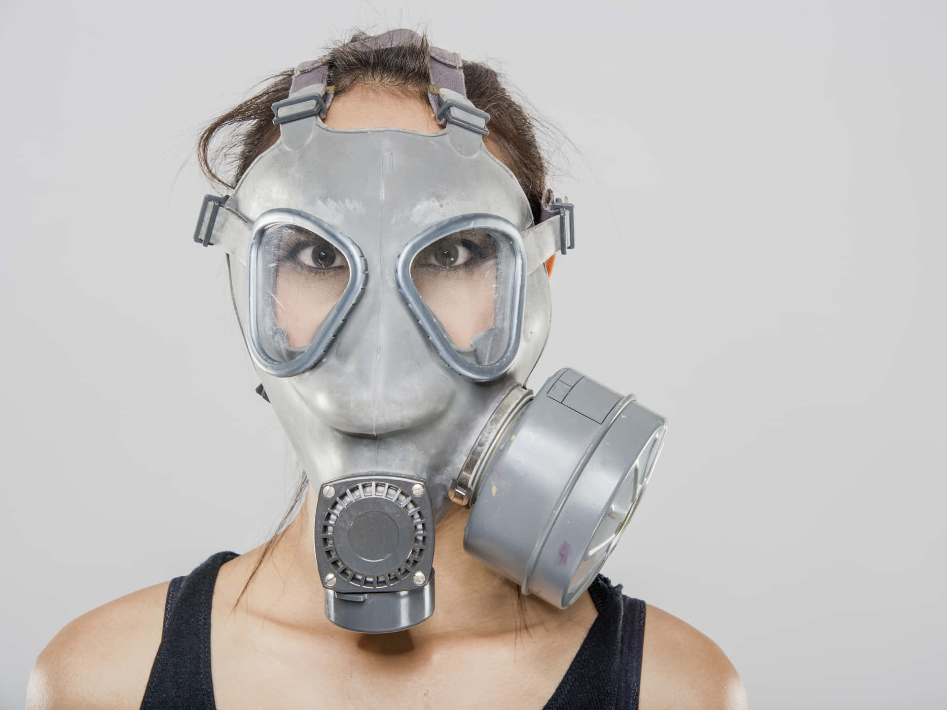 En kvinde iført gasmaske. Wallpaper