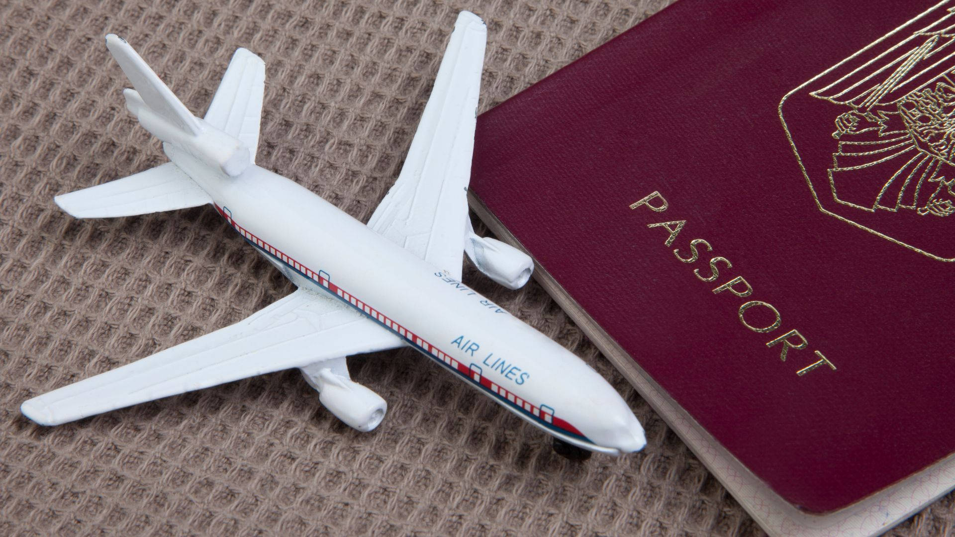 Toy Airplane With Passport Wallpaper