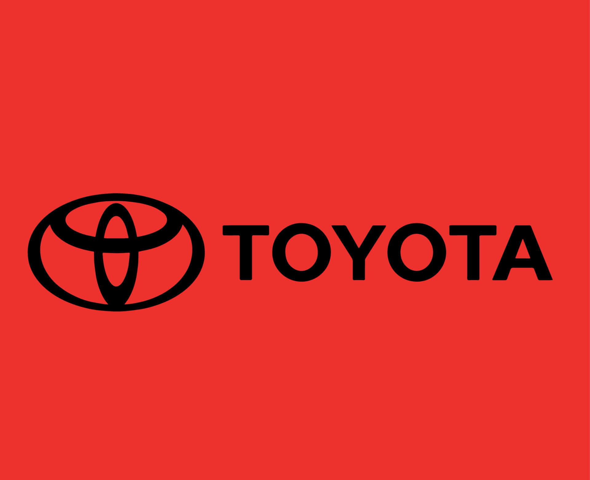 Toyotalogotypen På En Röd Bakgrund