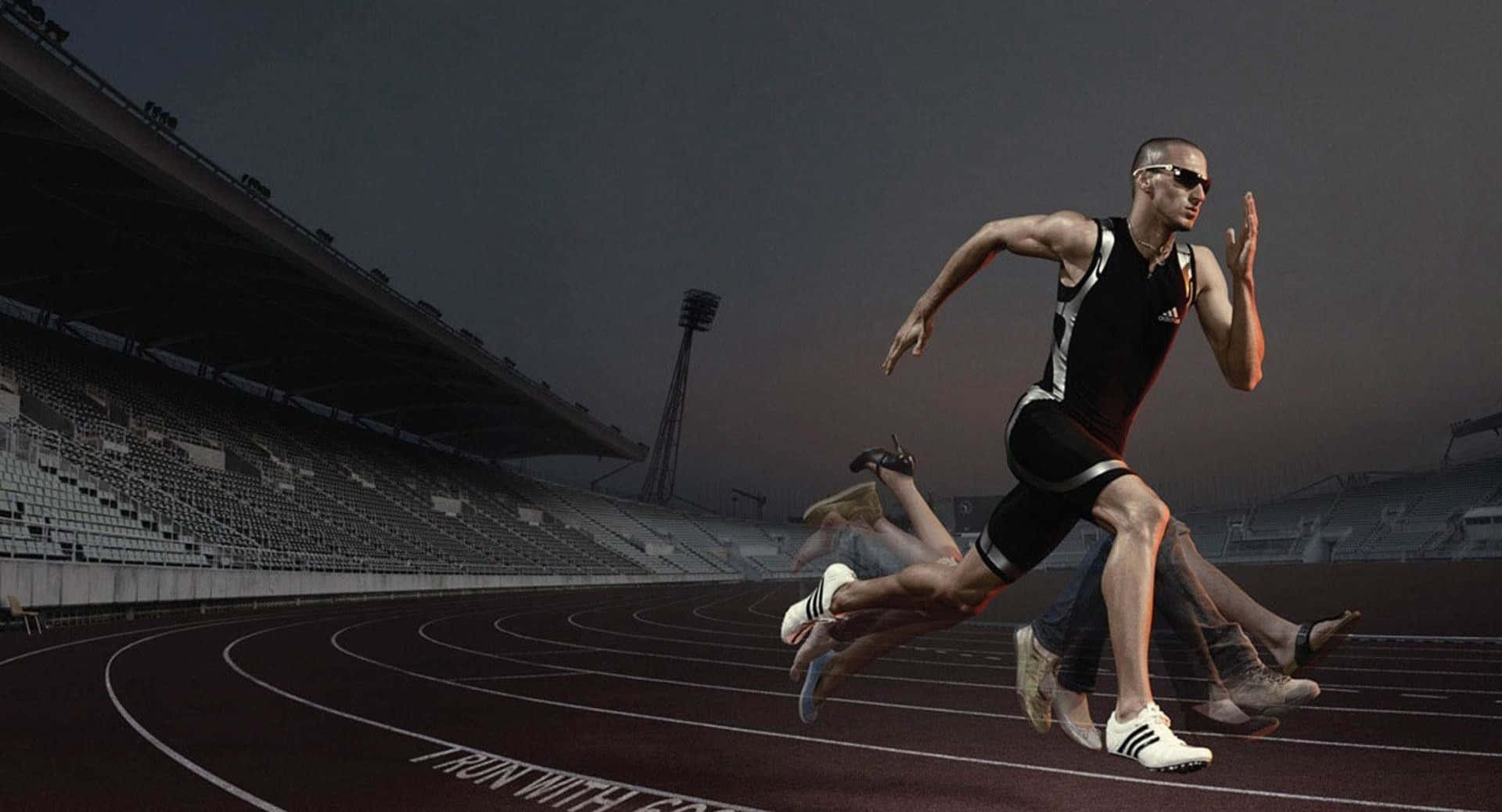 A Man Running On A Track At Night