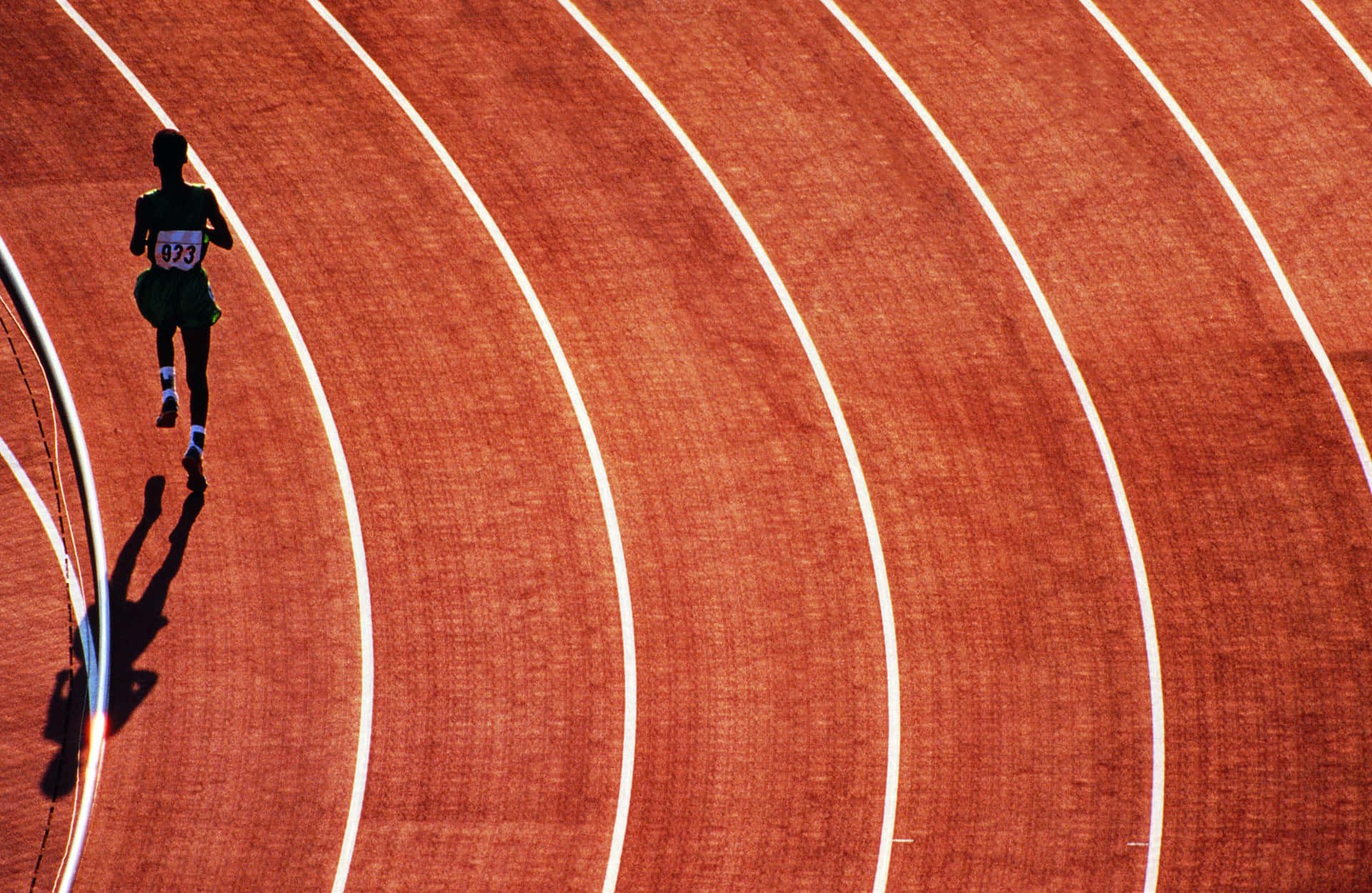 A Person Running On A Track