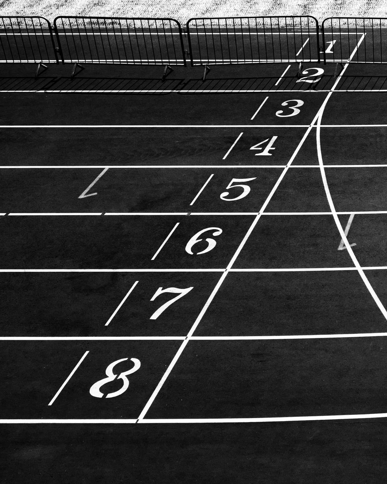 A Black And White Photo Of A Track