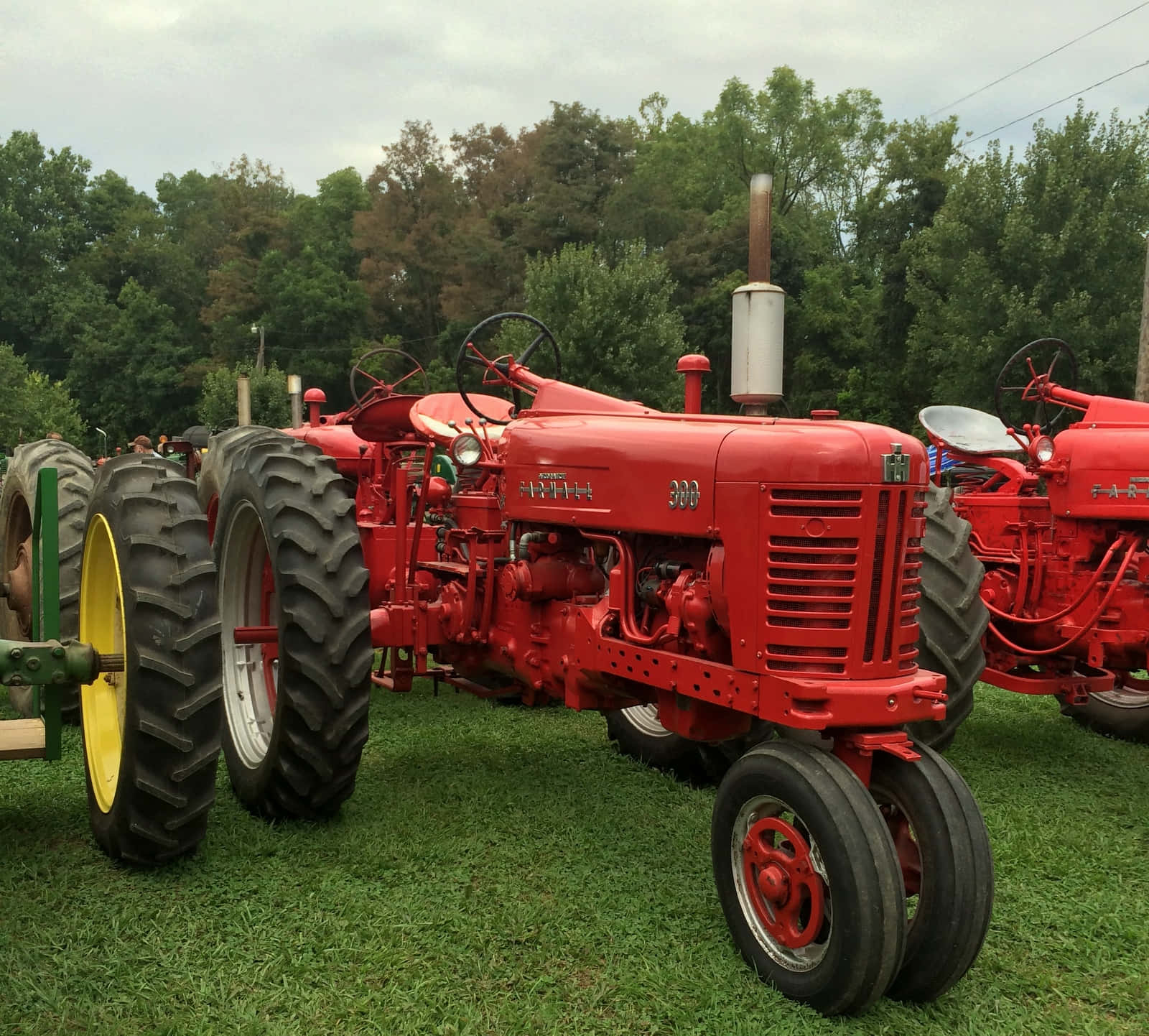 Caption: Powerful agriculture tractor on a farm