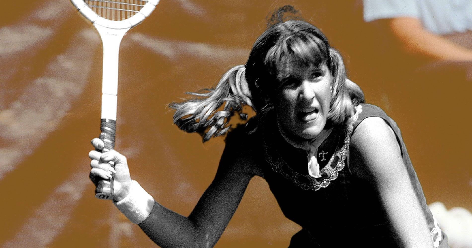 Legendary Tennis Player Tracy Austin Against Brown Background Wallpaper