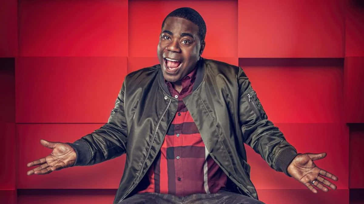 Tracy Morgan Smiling in a Formal Attire Wallpaper