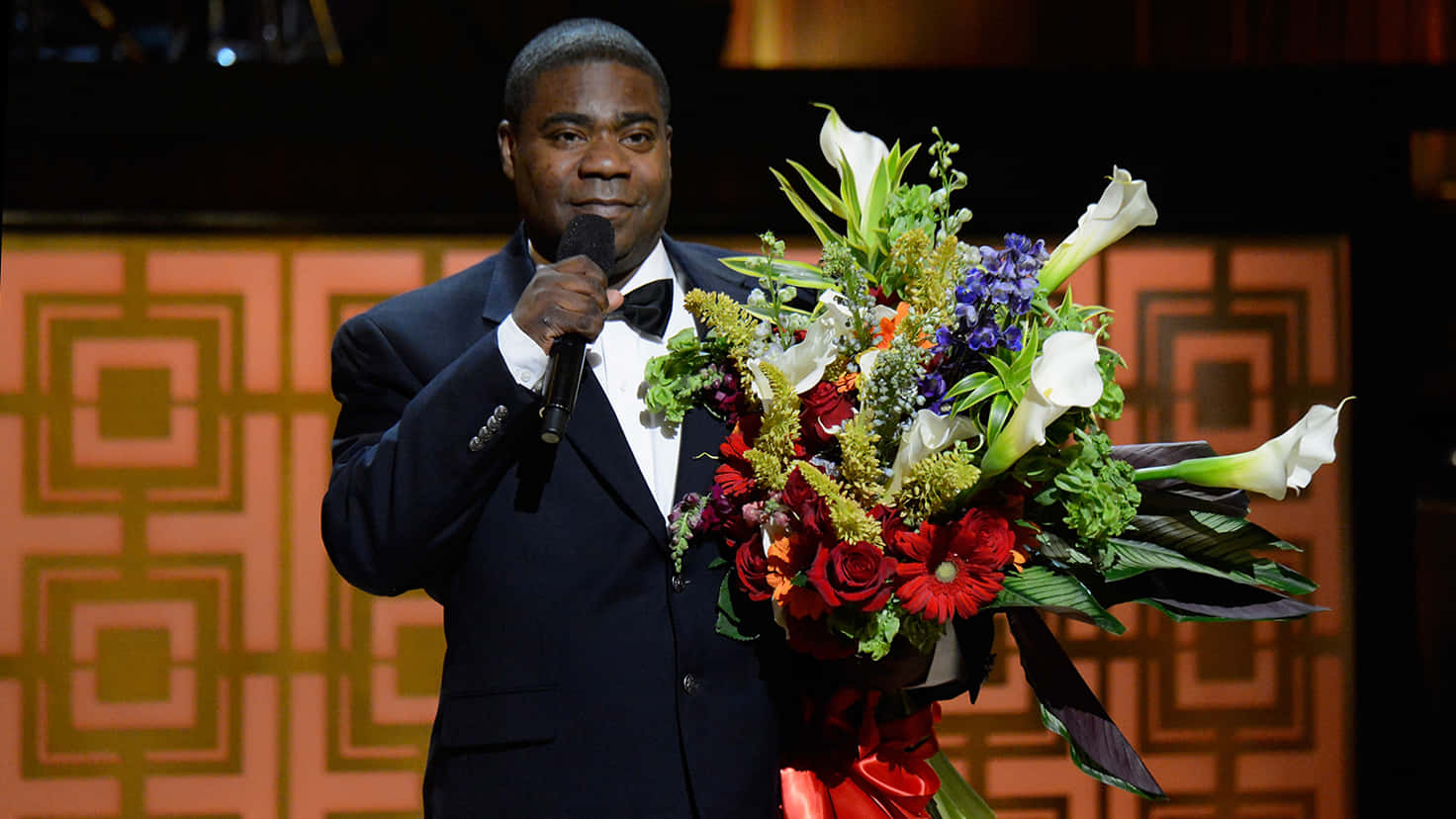 Tracymorgan Sonriendo Durante Un Evento Fondo de pantalla