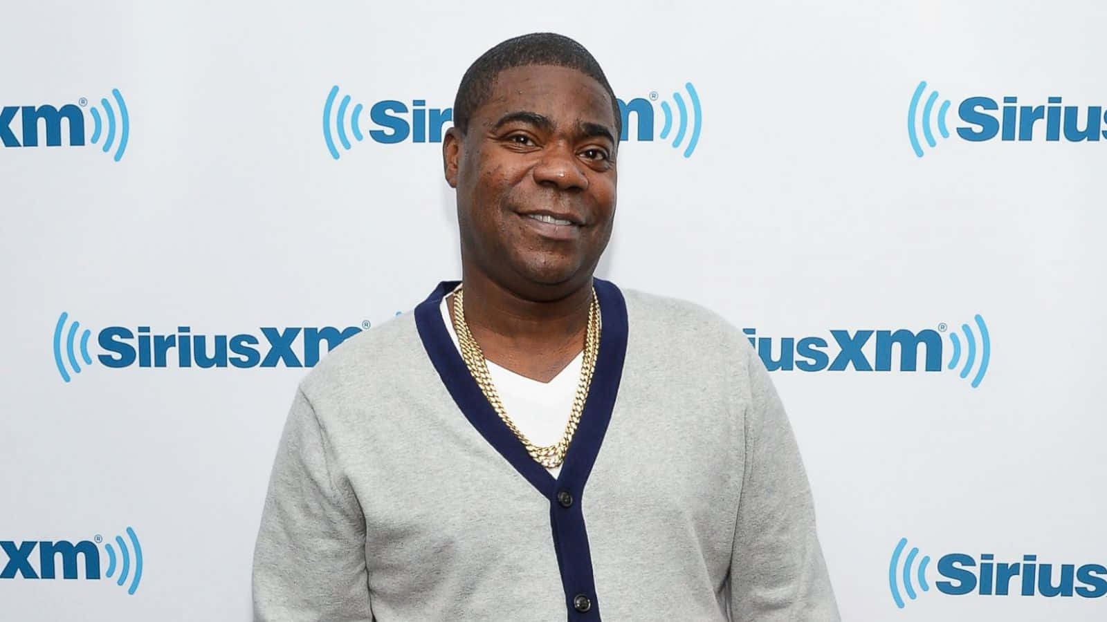 American comedian and actor Tracy Morgan posing for a photo Wallpaper