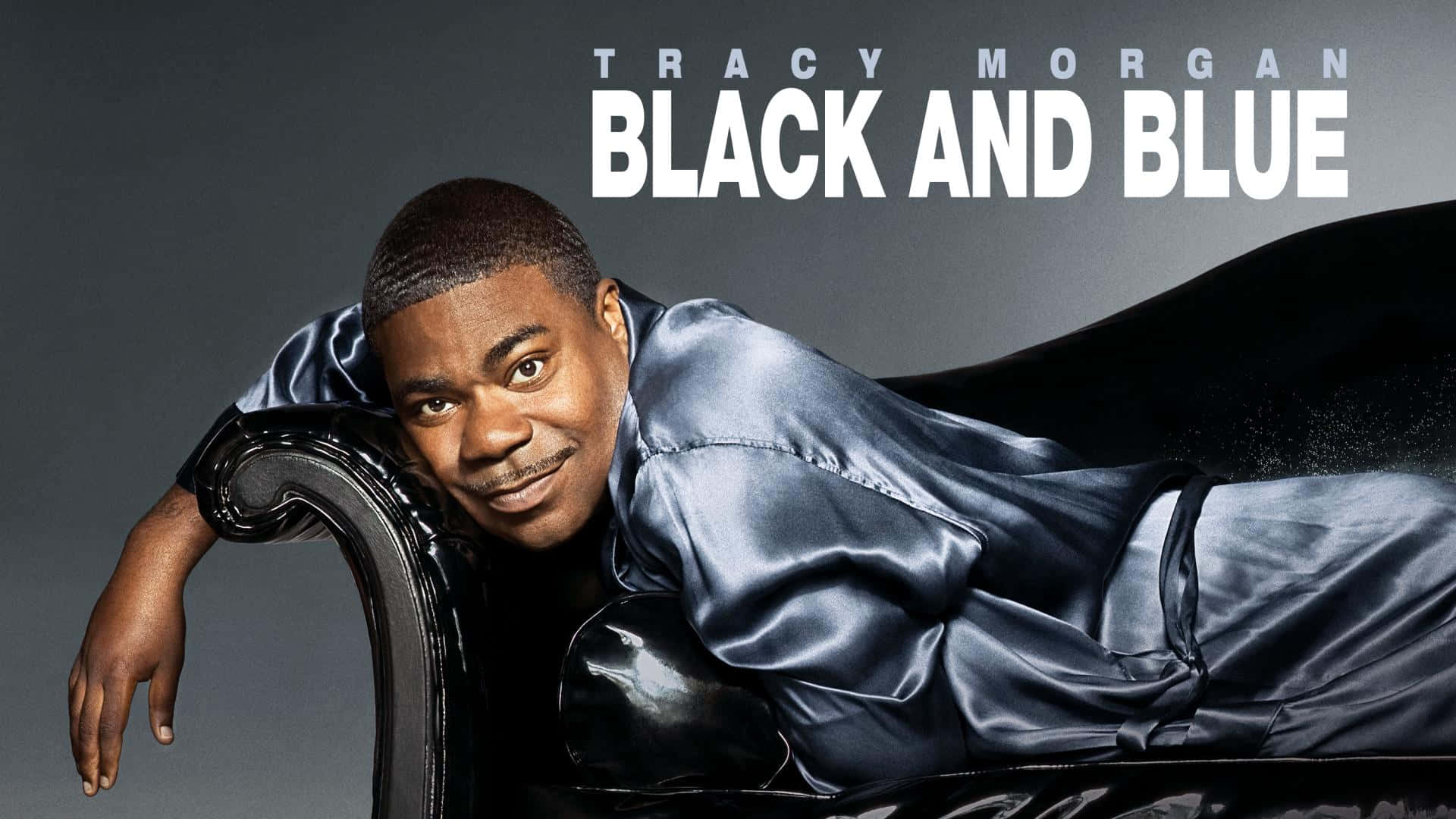 Elcomediante Tracy Morgan Sonriendo En Un Evento De Alfombra Roja. Fondo de pantalla