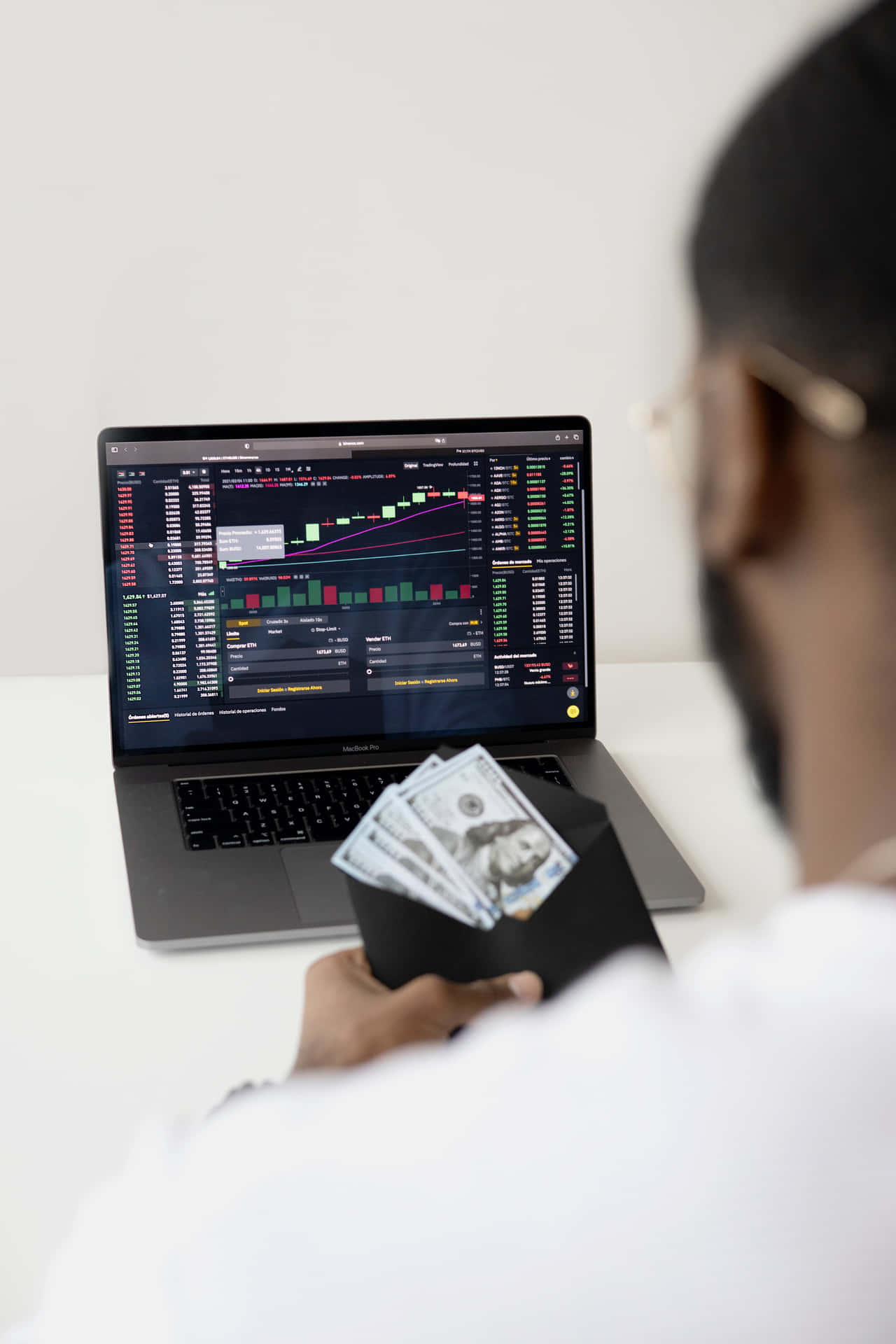 Trader Analyzing Stock Market Data Wallpaper