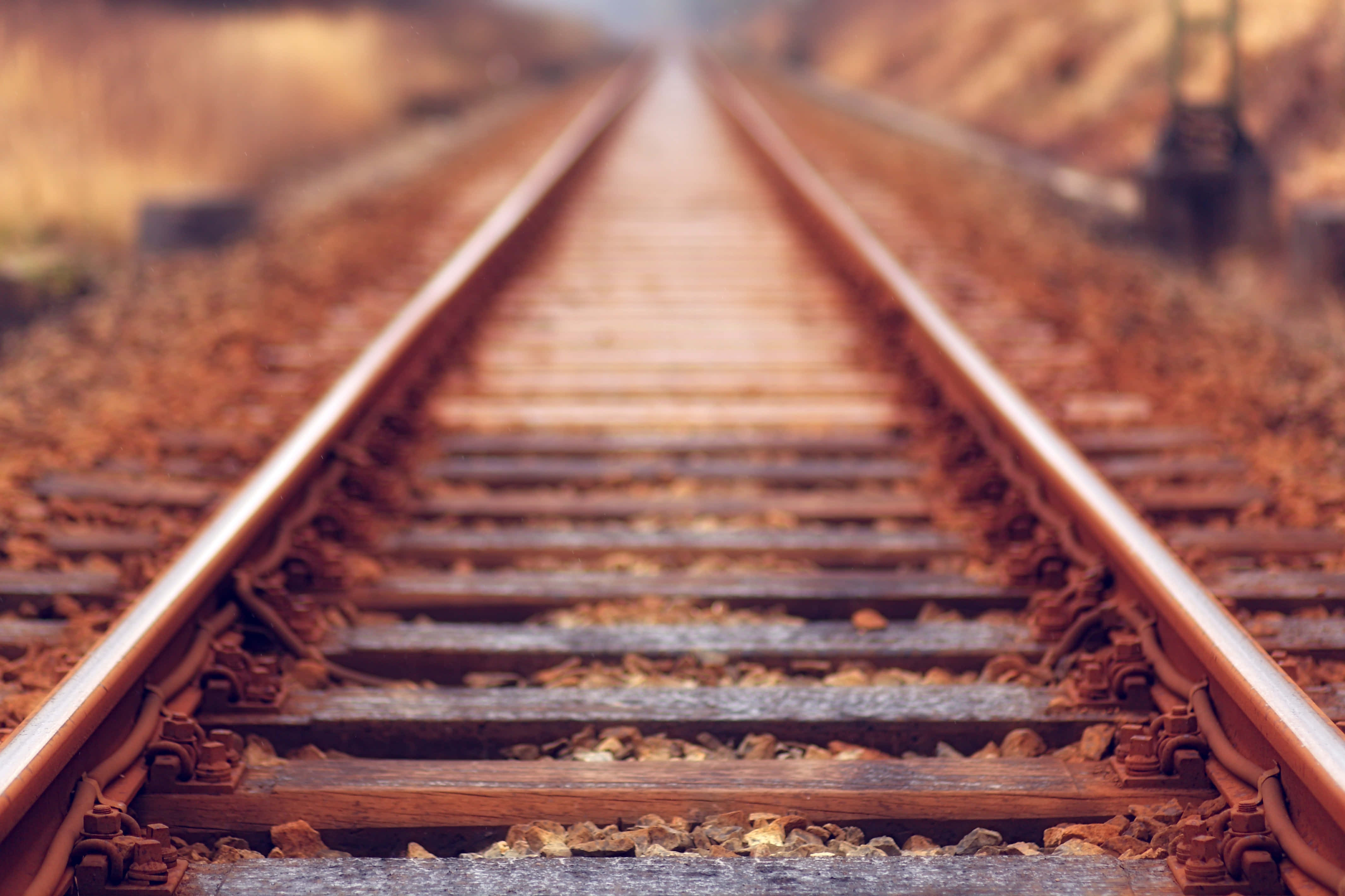 A Train Track With A Blurred Background