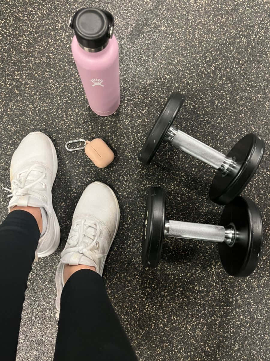 A Pair Of Shoes, A Water Bottle And Dumbbells Wallpaper