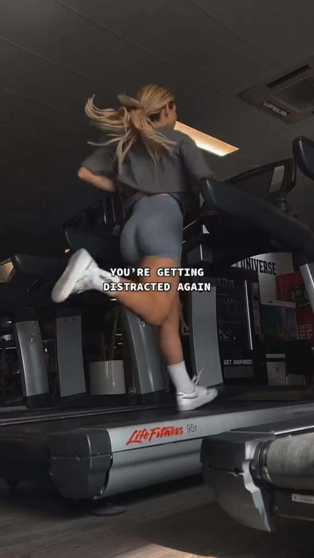 A Woman Running On A Treadmill With The Text You're Getting Distracted Made Wallpaper
