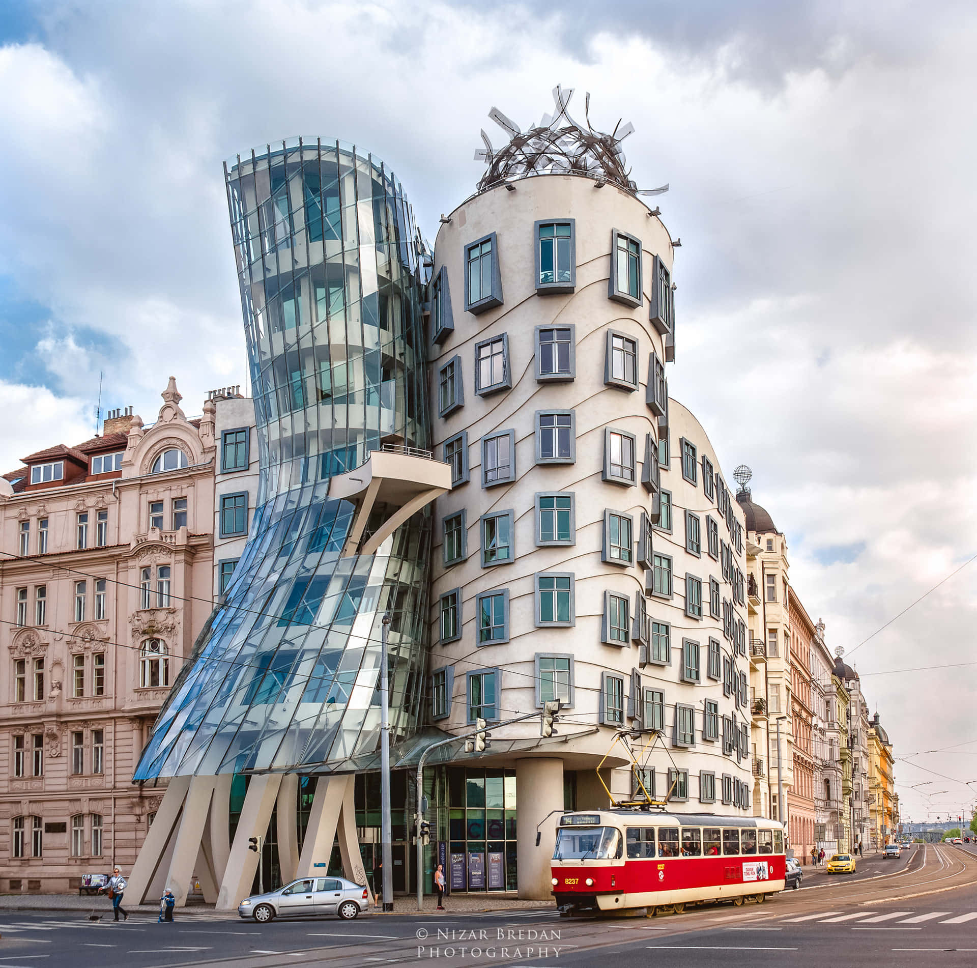 "Tram Passing by the Dancing House in Prague" Wallpaper