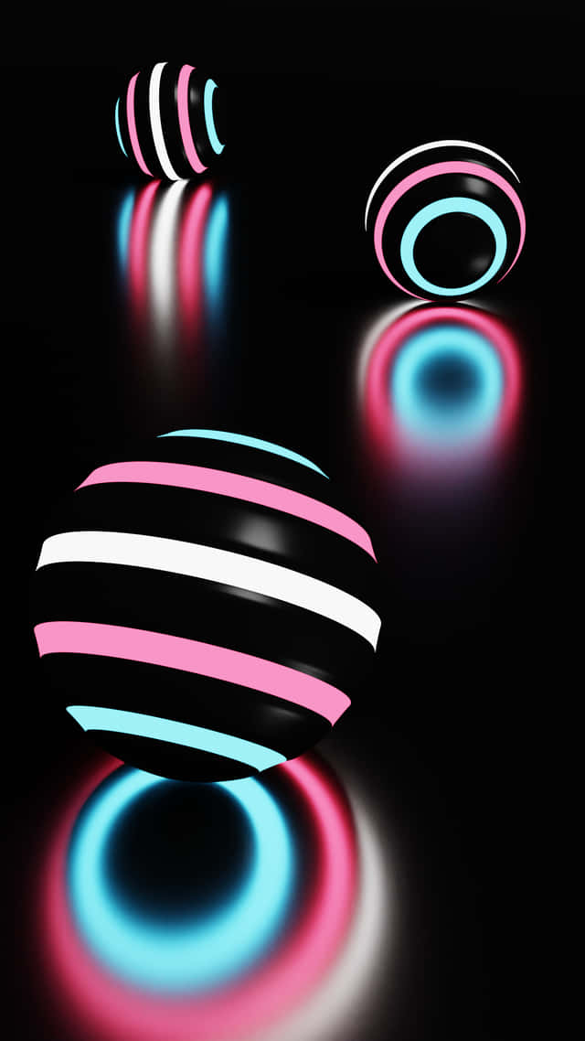 A Set Of Colorful Striped Balls On A Black Background Wallpaper