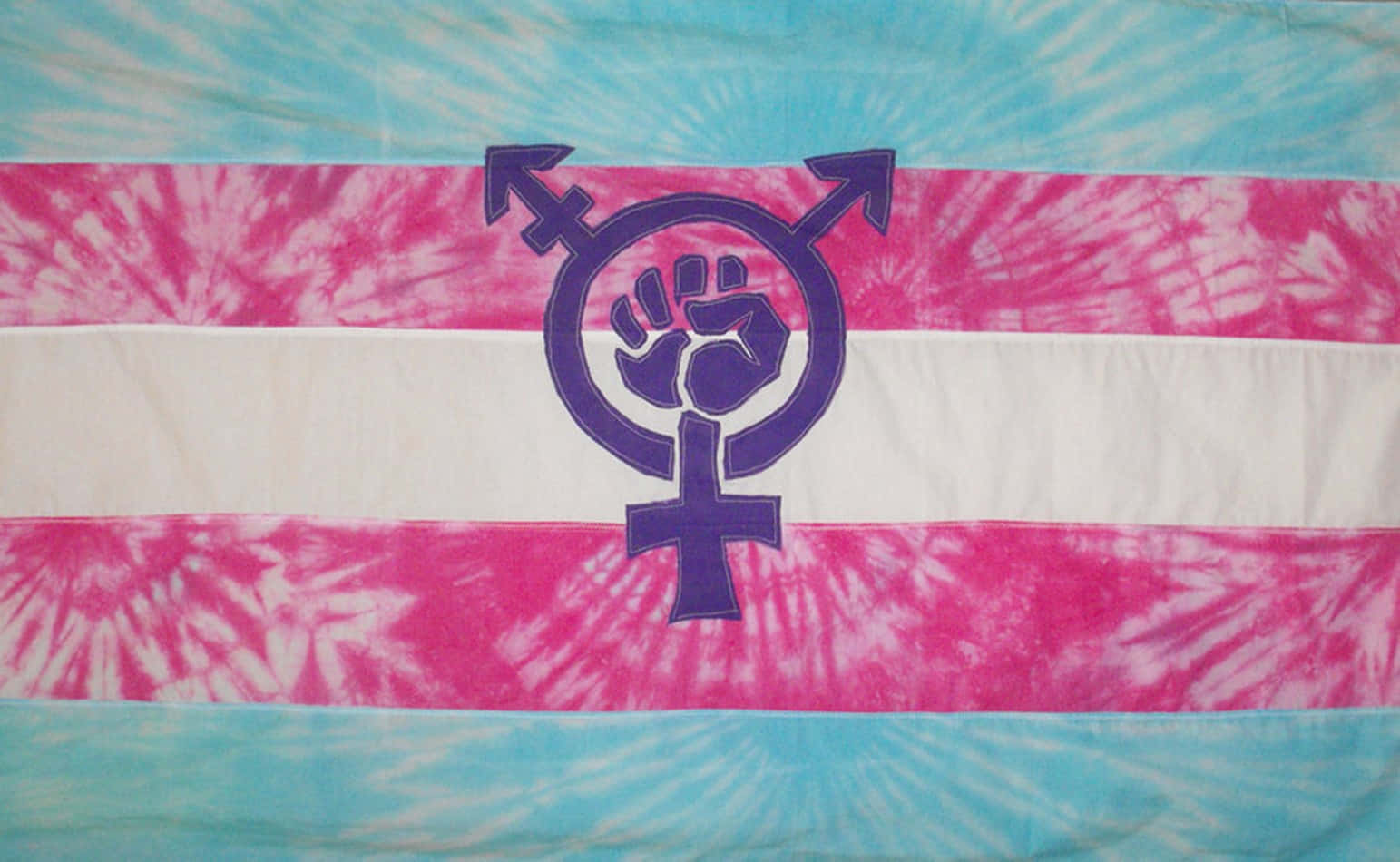 Tie Dye Trans Flag And Symbol Wallpaper