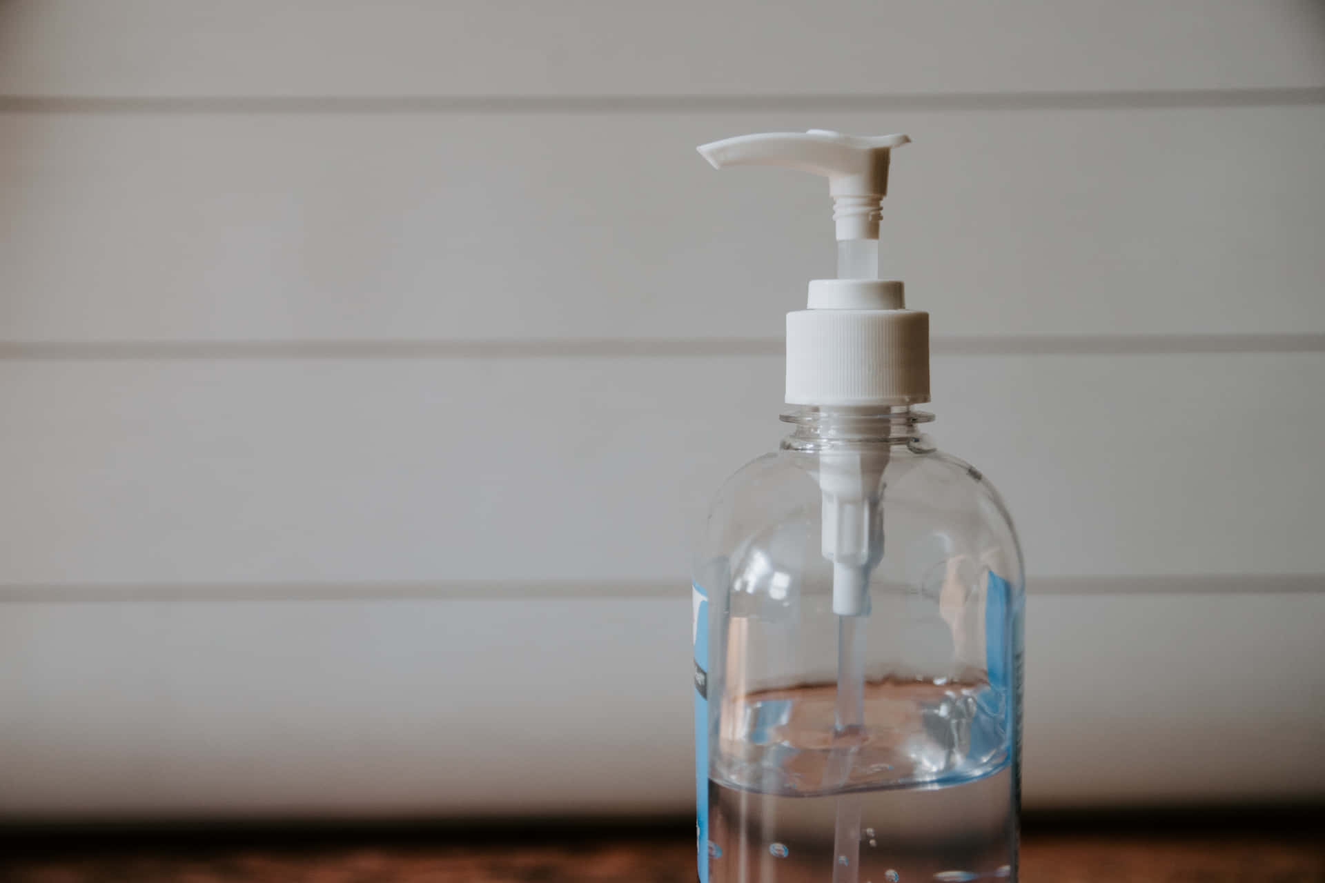 Transparent Bottle Of Antiseptic Liquid Wash Wallpaper