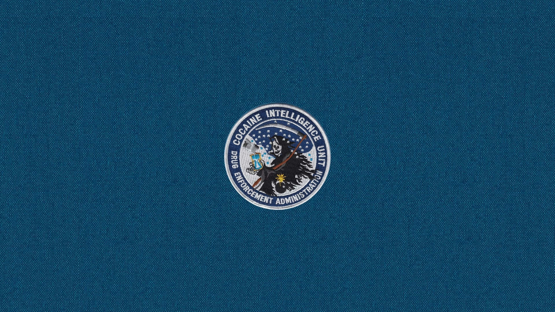 A Blue Background With A Seal On It Wallpaper