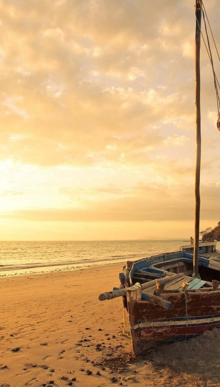 Rejse iPhone båd på sand solnedgang tapet Wallpaper