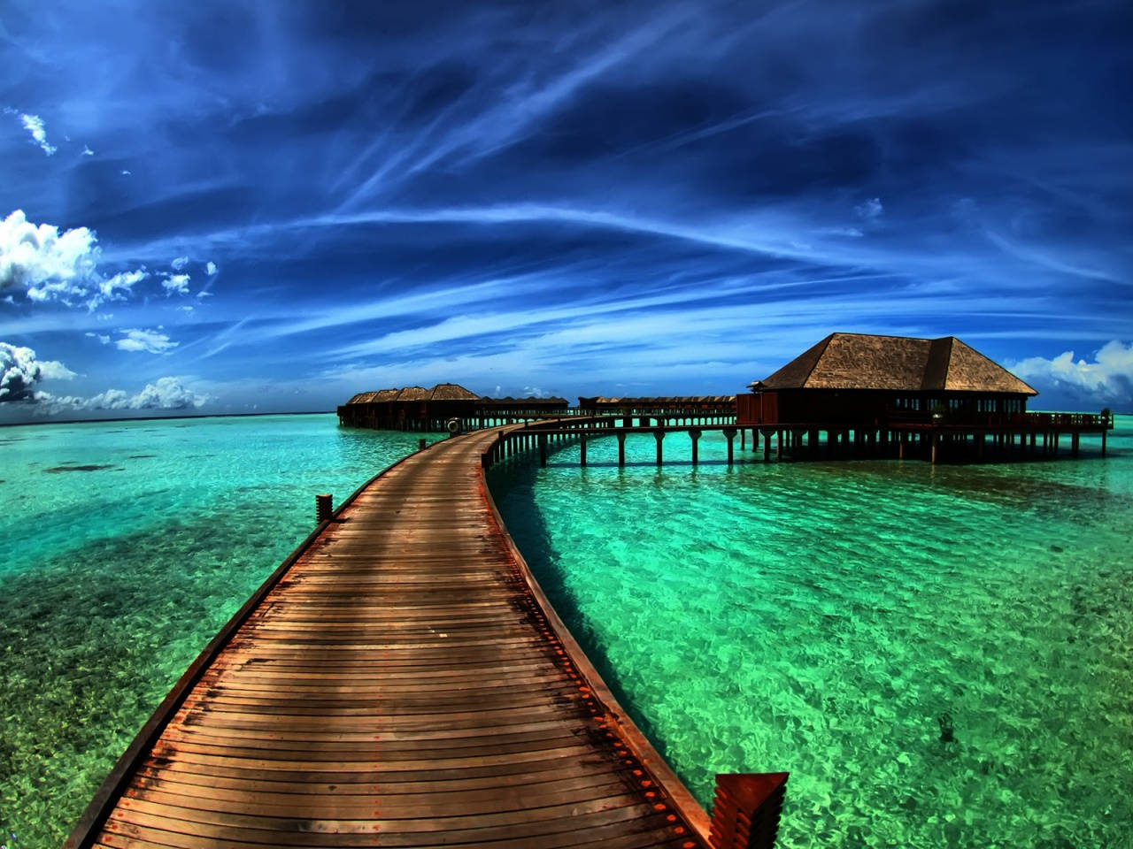 Fascinantefoto Panorámica De La Laptop Durante Un Viaje A Las Maldivas Fondo de pantalla