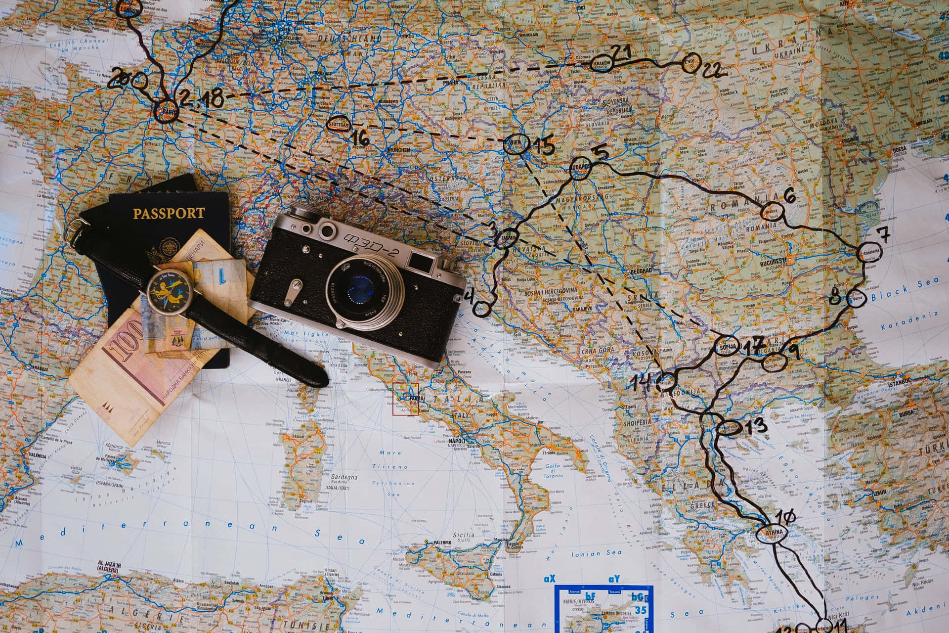 Travel Planning Essentials Map Camera Passport Money Wallpaper