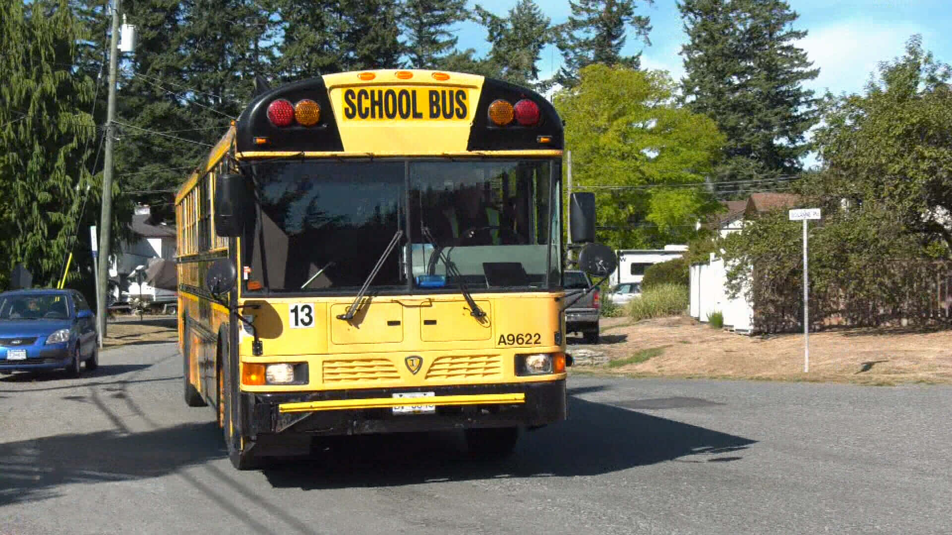 Traveling School Bus Front View Wallpaper