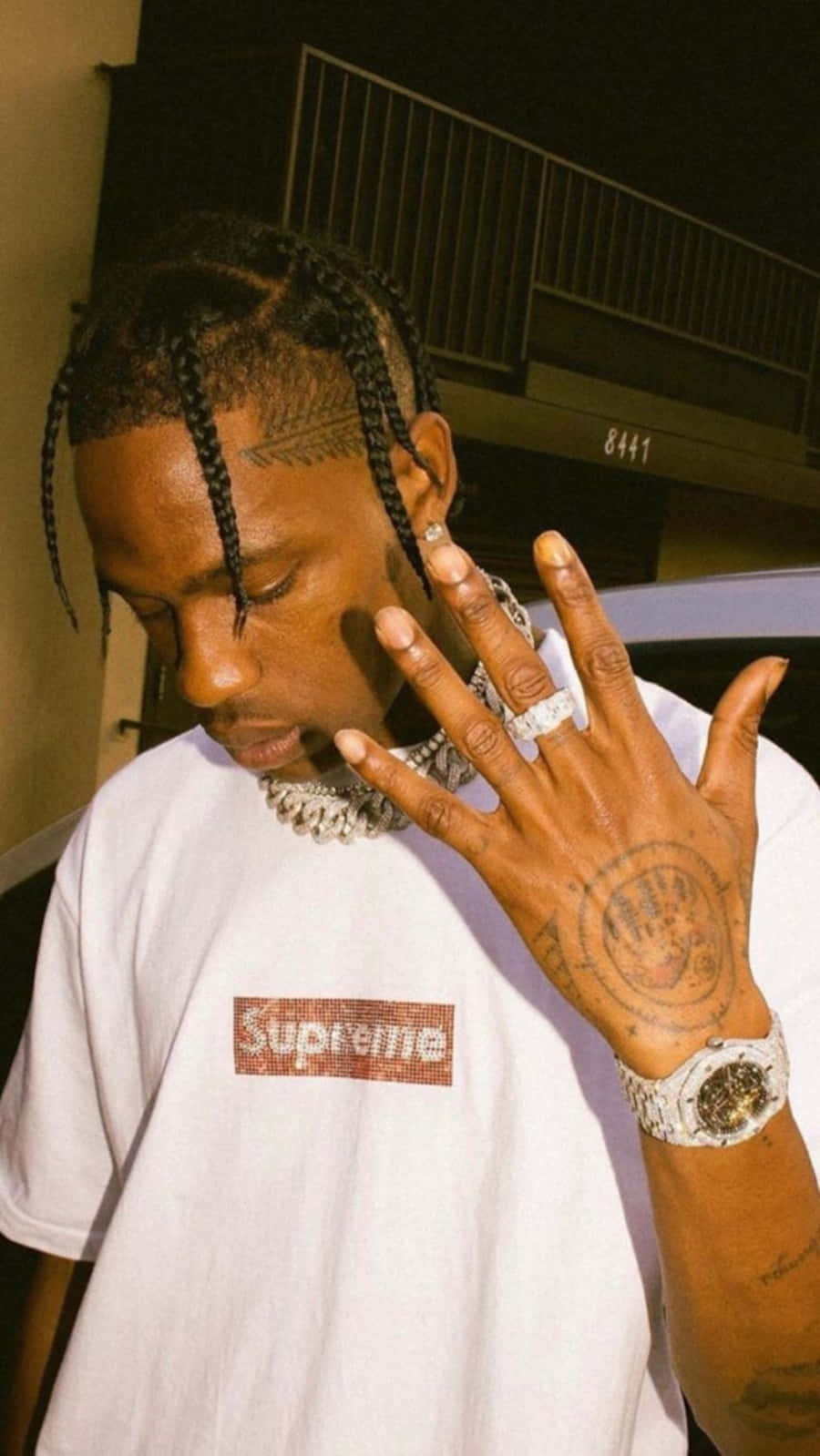 Travis Scott's music playing on the new iPhone Wallpaper
