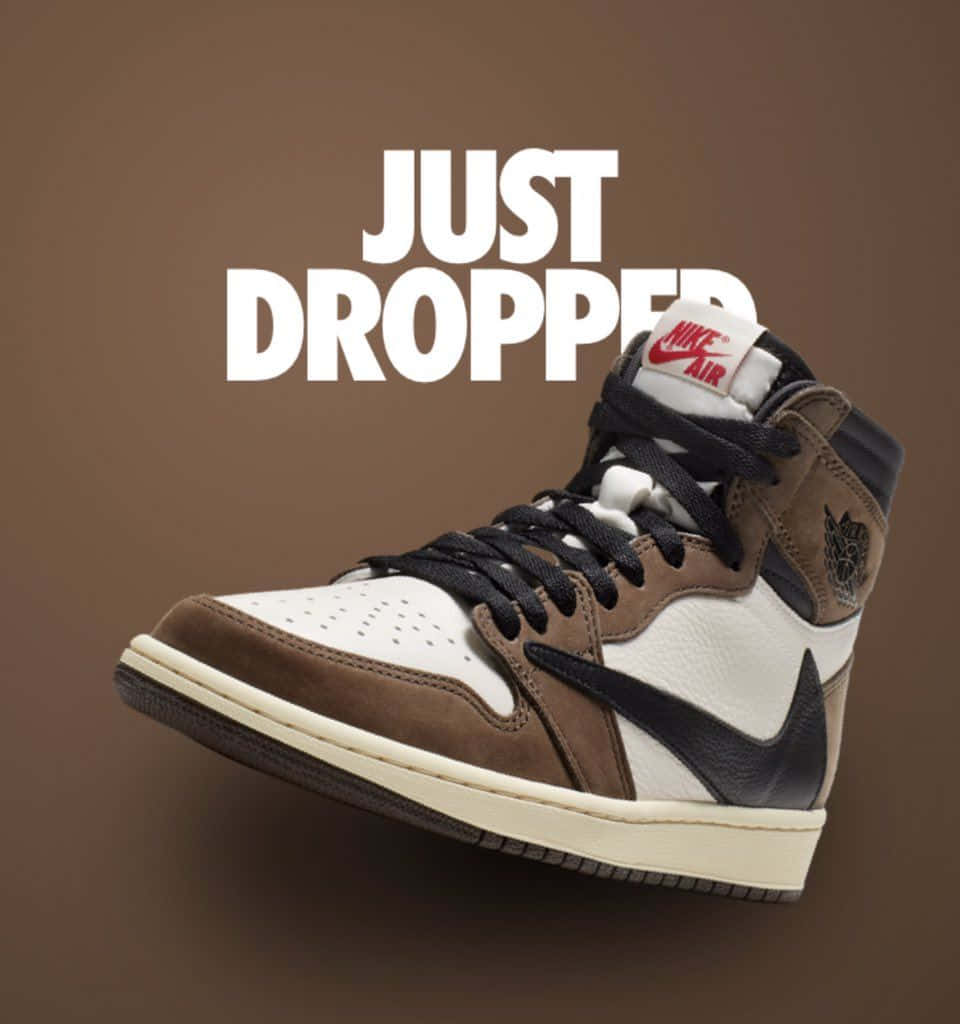 Download Travis Scott wearing the iconic Jordan 1 sneakers