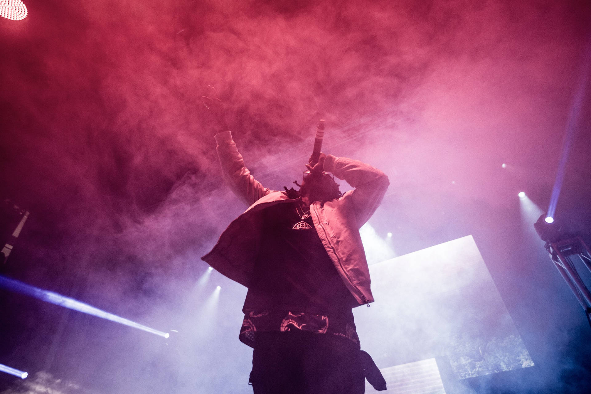 Travis Scott takes the stage in his signature style Wallpaper