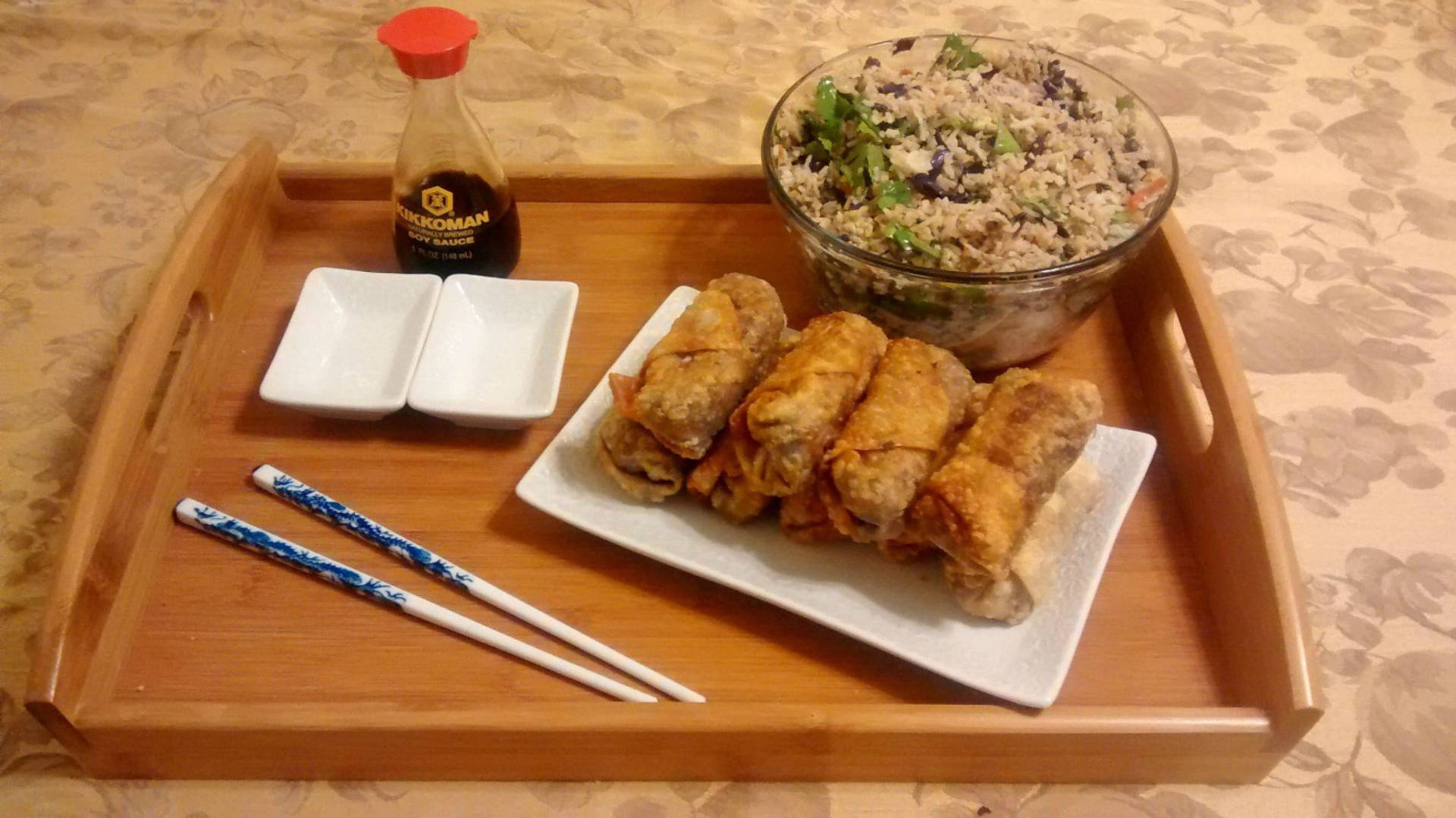 Tray Of Egg Rolls And Fried Rice