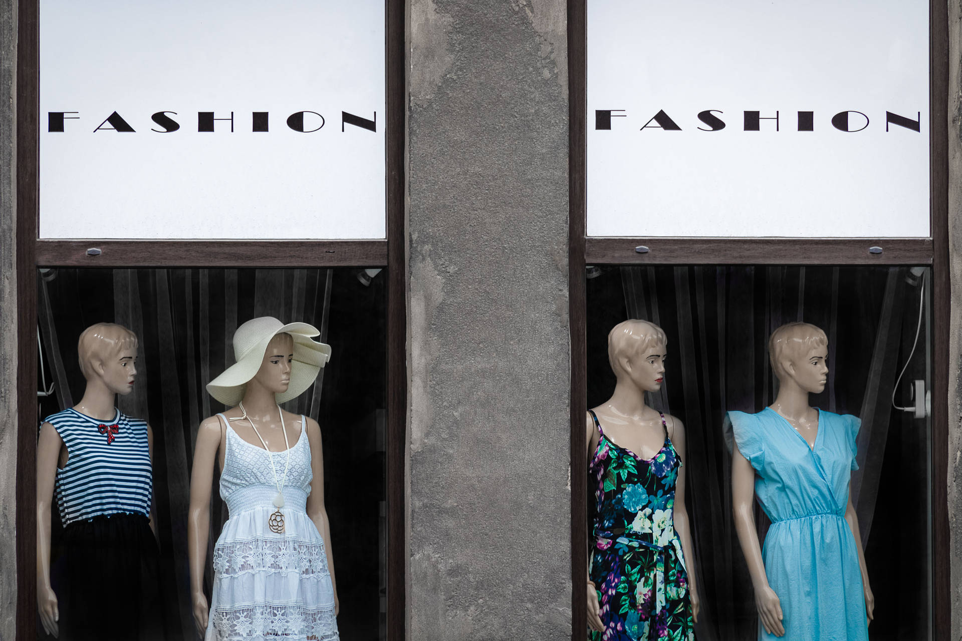 Caption: Trendsetting Fashion Dresses Showcasing Bold Statements Wallpaper