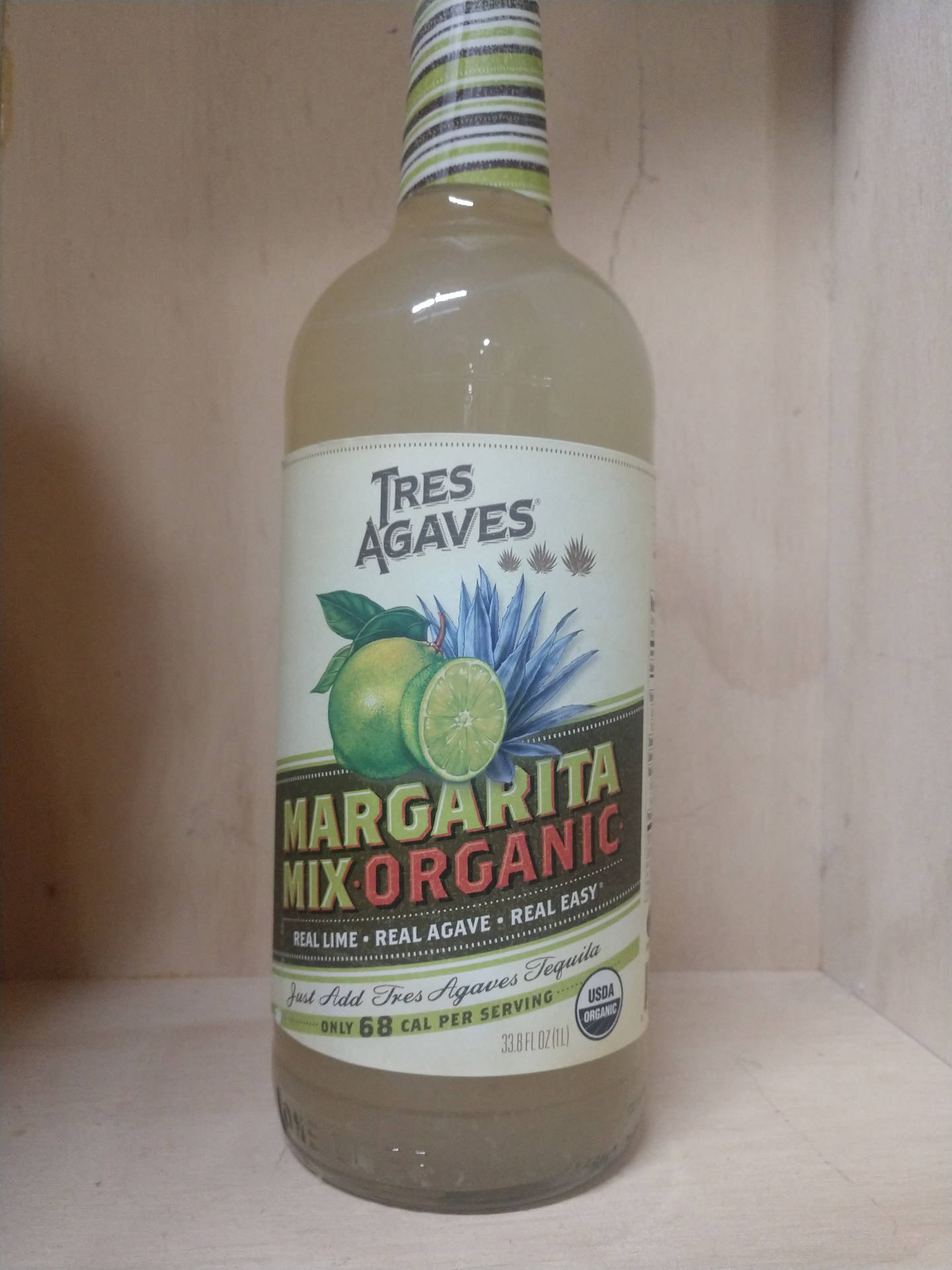Tres Agaves Organic Margarita White Liquid Wallpaper