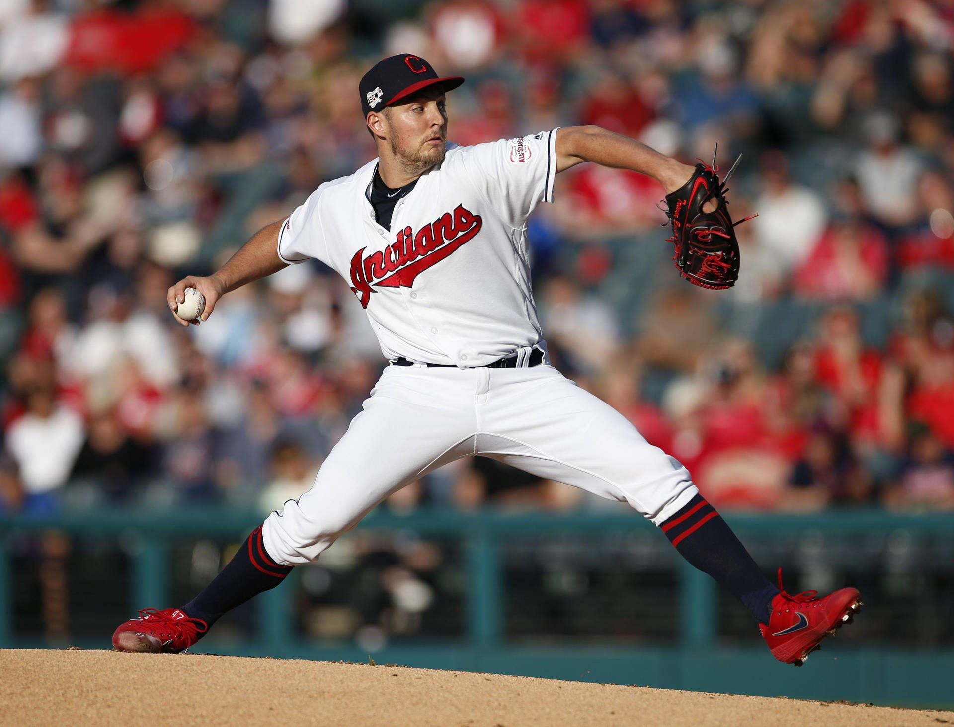 Download Trevor Bauer In Indians Outfit Jumping Wallpaper