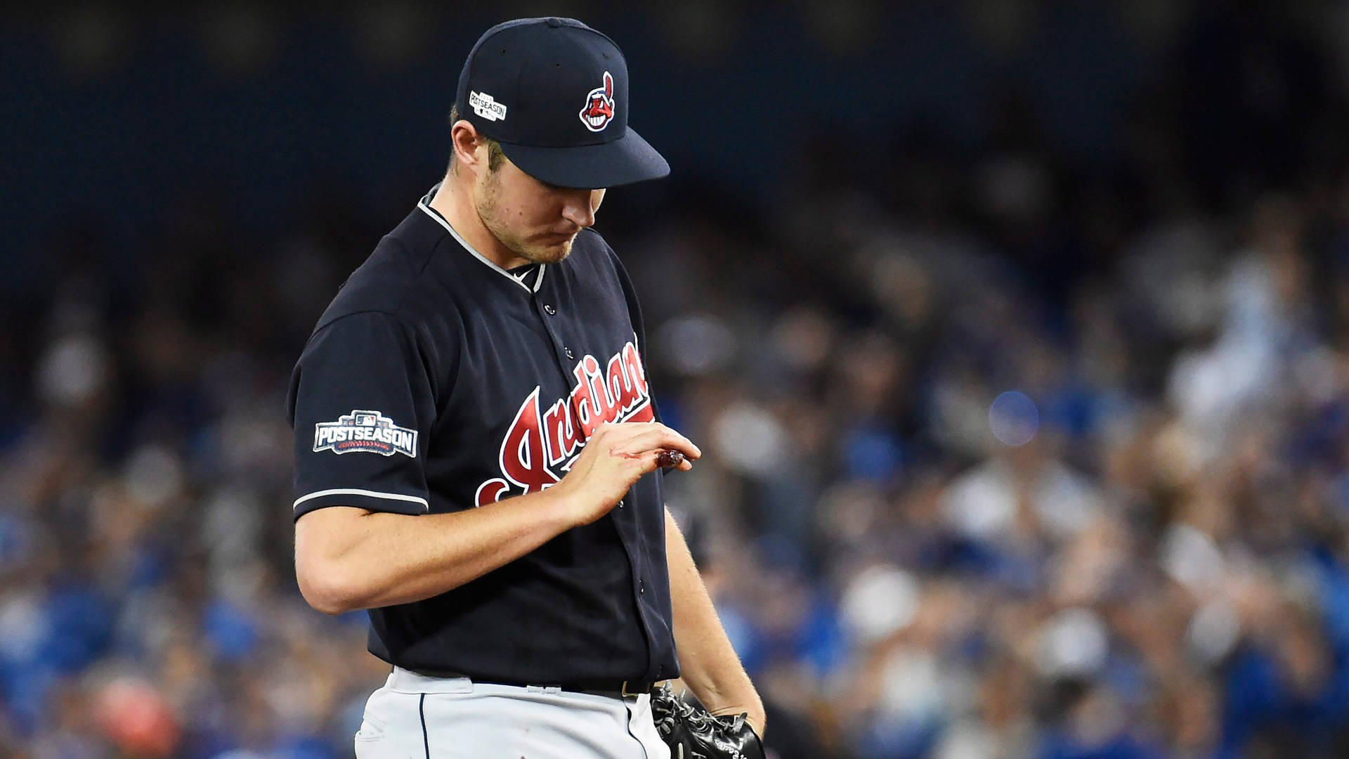 Trevor Bauer Looking At His Hand Wallpaper