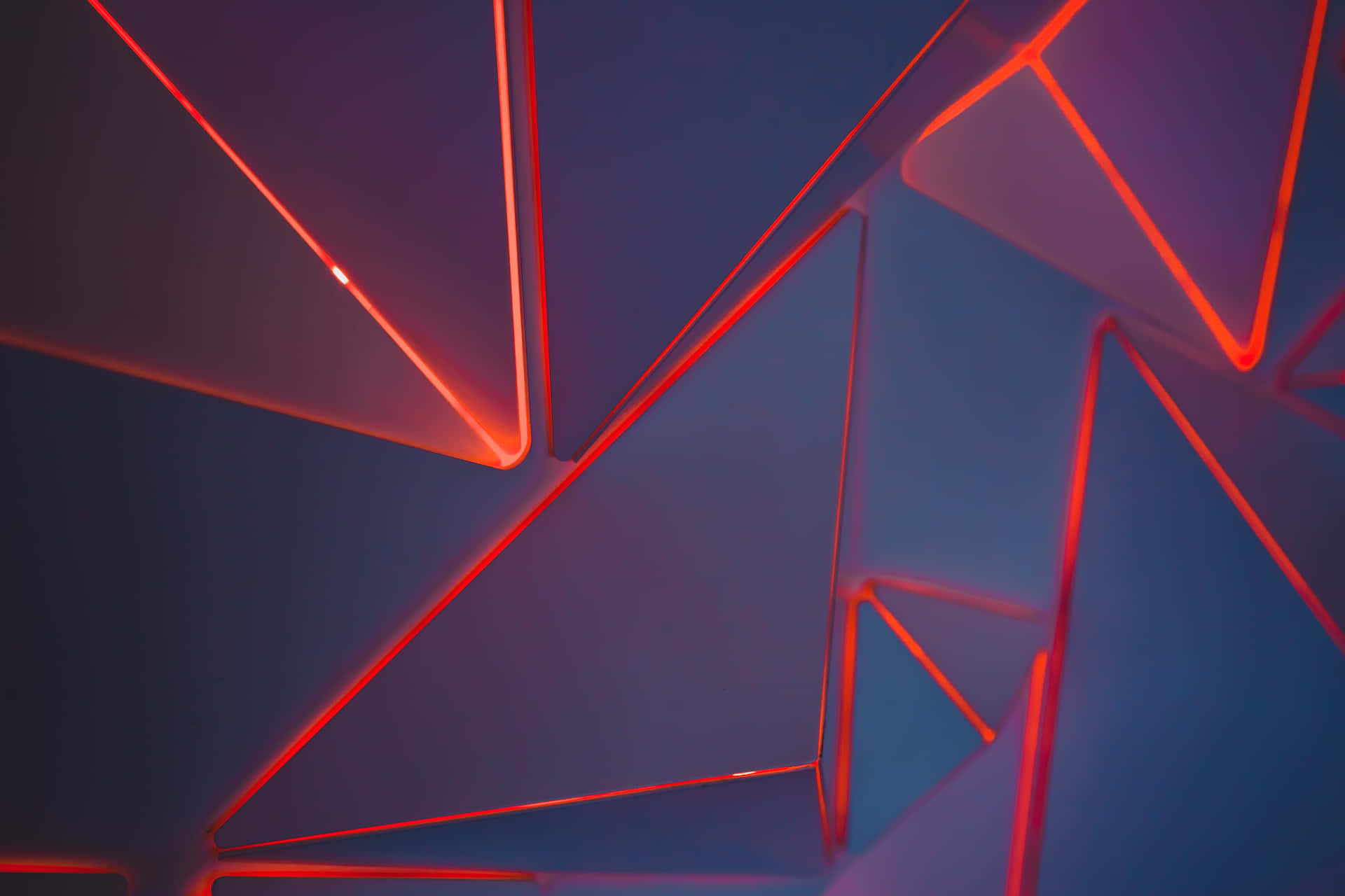 A Red And Blue Abstract Background With Triangles