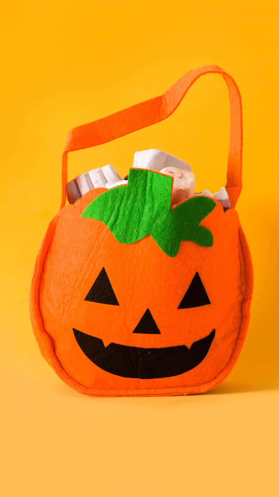 Brightly Colored Trick or Treat Bags to Celebrate Halloween Wallpaper