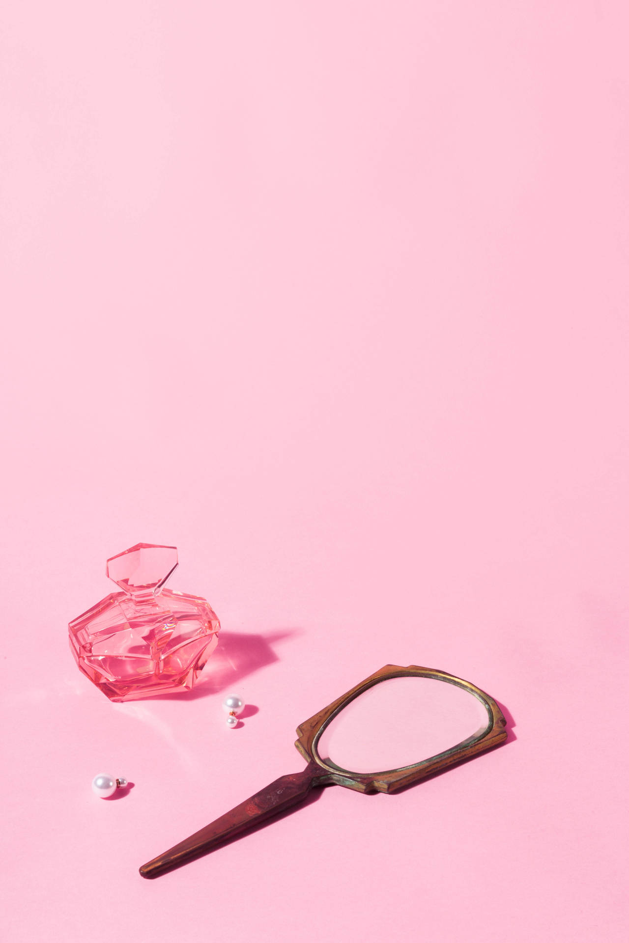 Trinkets On A Pink Color