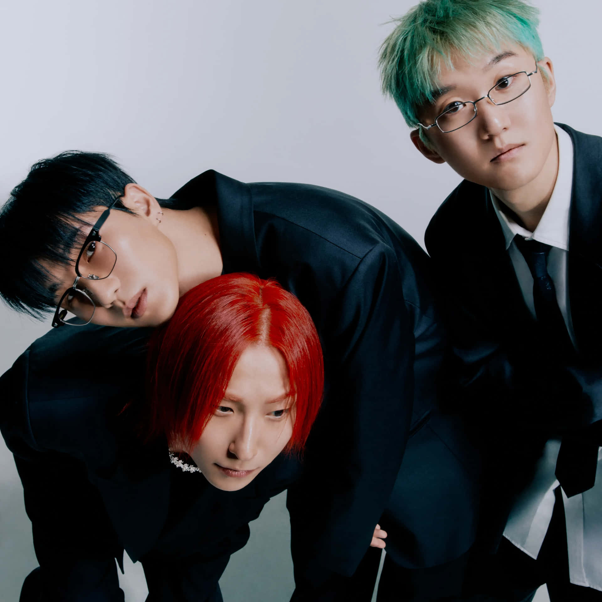 Trio_with_ Colored_ Hair_and_ Stylish_ Suits Wallpaper
