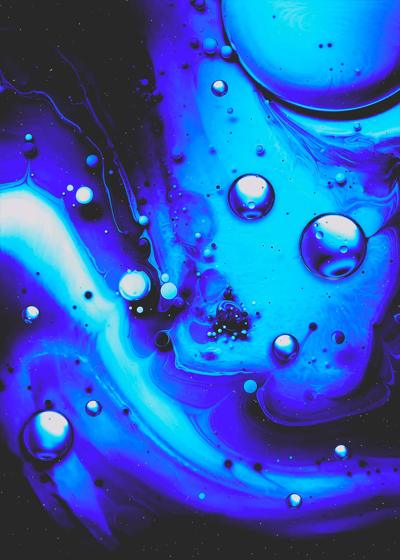 Blue Water Drops In A Blue Background Wallpaper