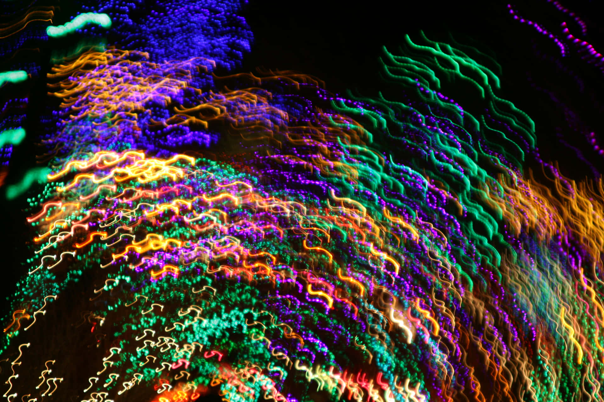 A Blurry Image Of A Colorful Tree