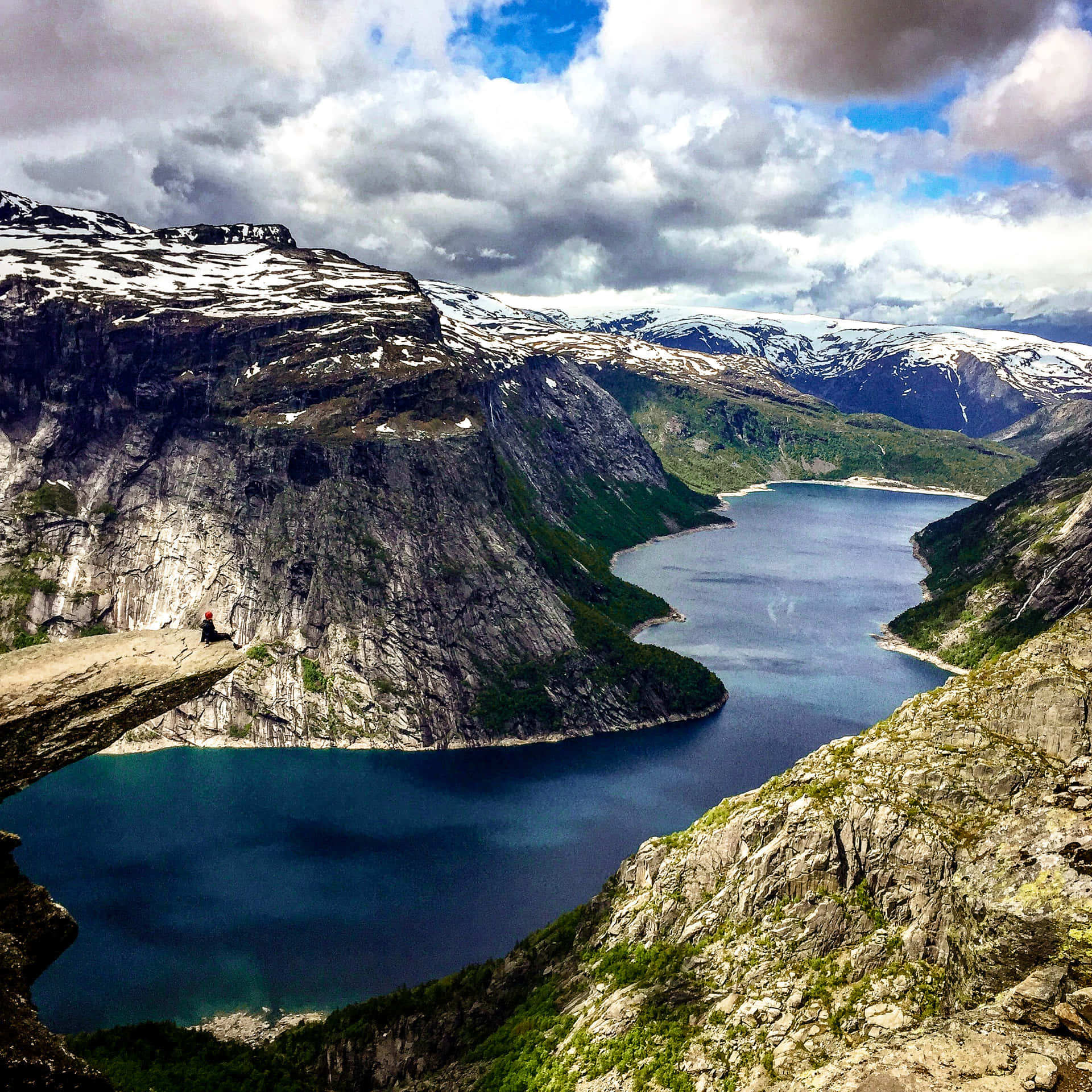 Trolltunga And Scenic Rock Formations Wallpaper