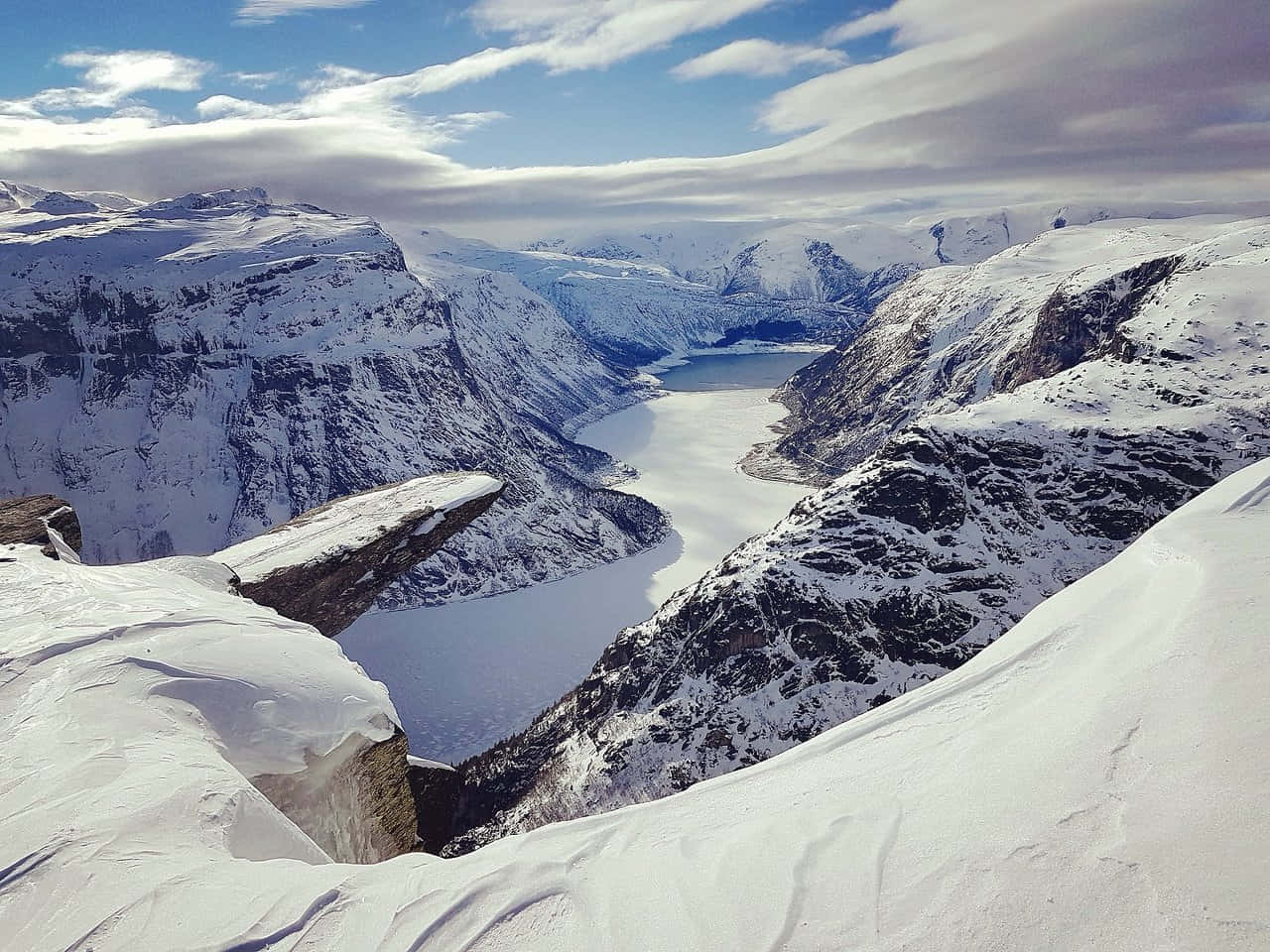 Trolltunga During Winter With Thick Snow Wallpaper